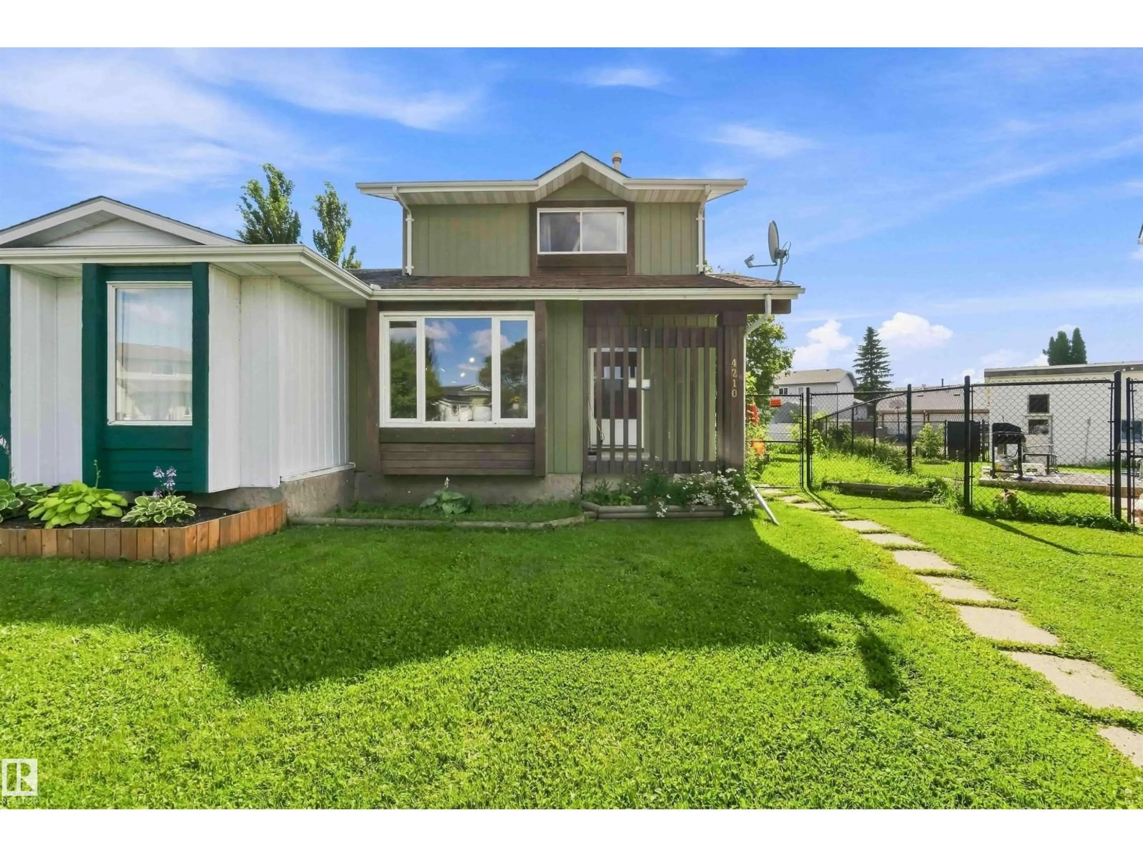 Home with vinyl exterior material, street for 4210 49 ST, Gibbons Alberta T0A1N0