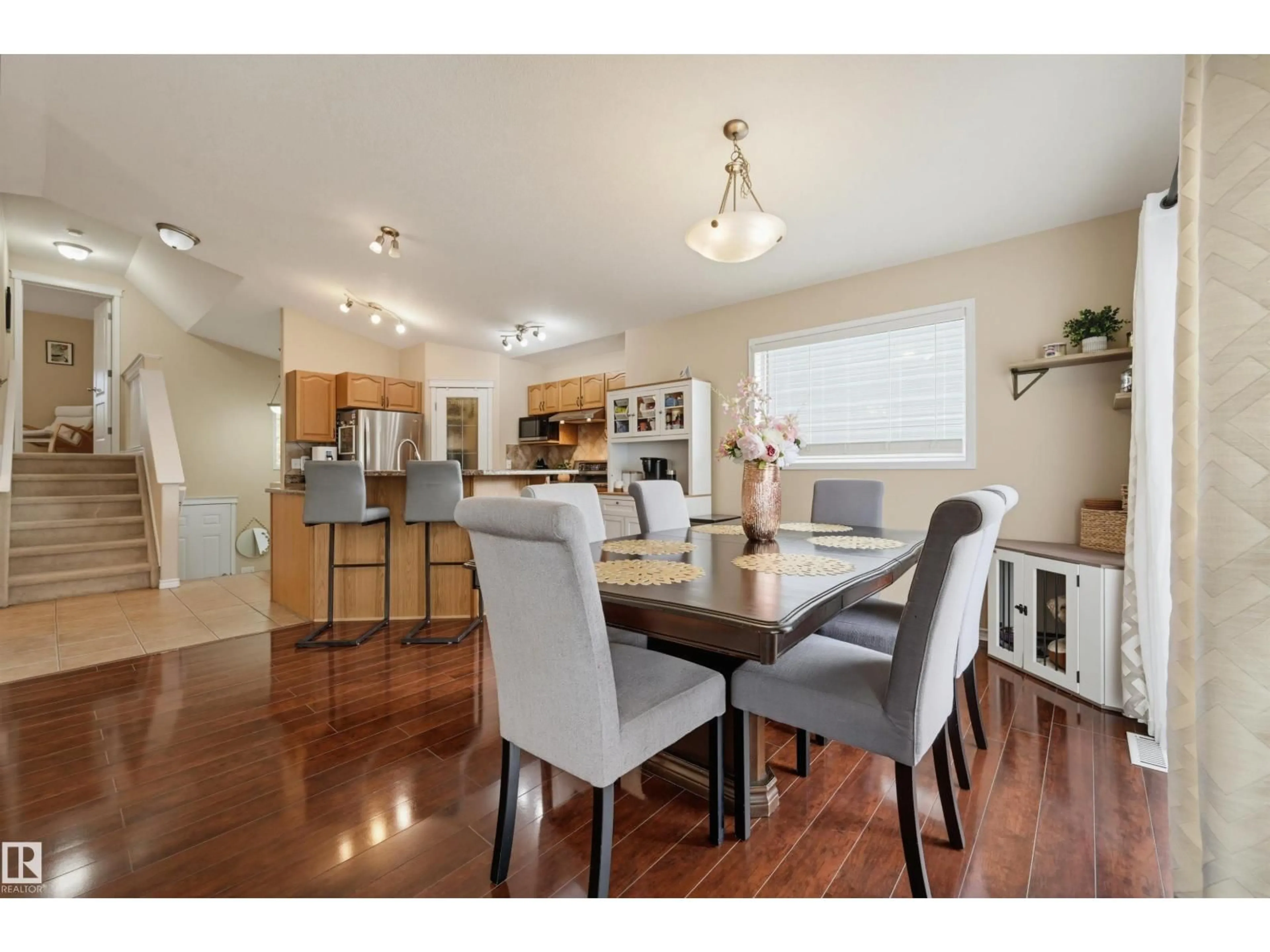 Open concept kitchen, wood/laminate floor for 4017 158 AV, Edmonton Alberta T5Y0A3