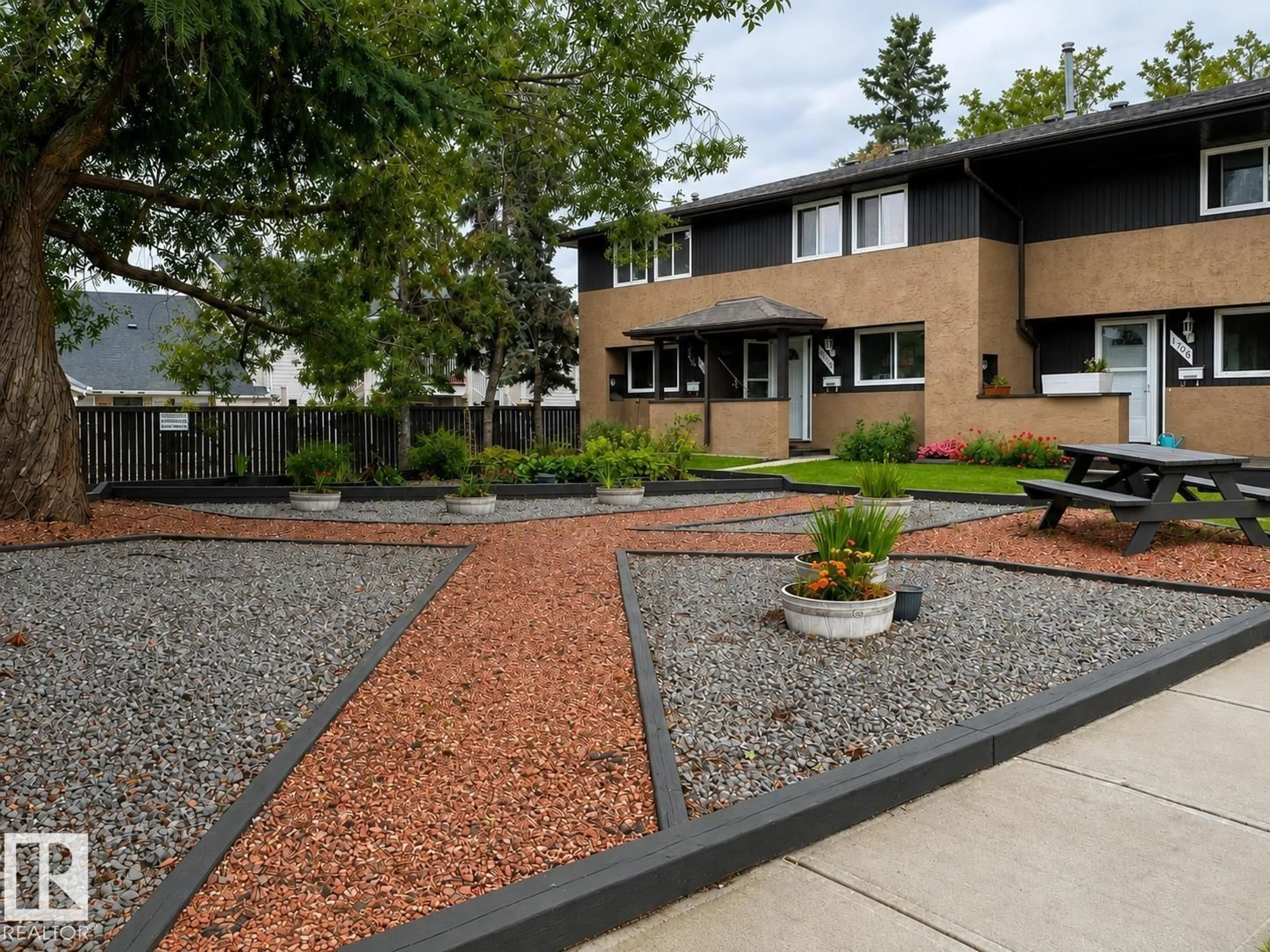 Home with brick exterior material, street for NW - 1704 37 ST, Edmonton Alberta T6L2R7