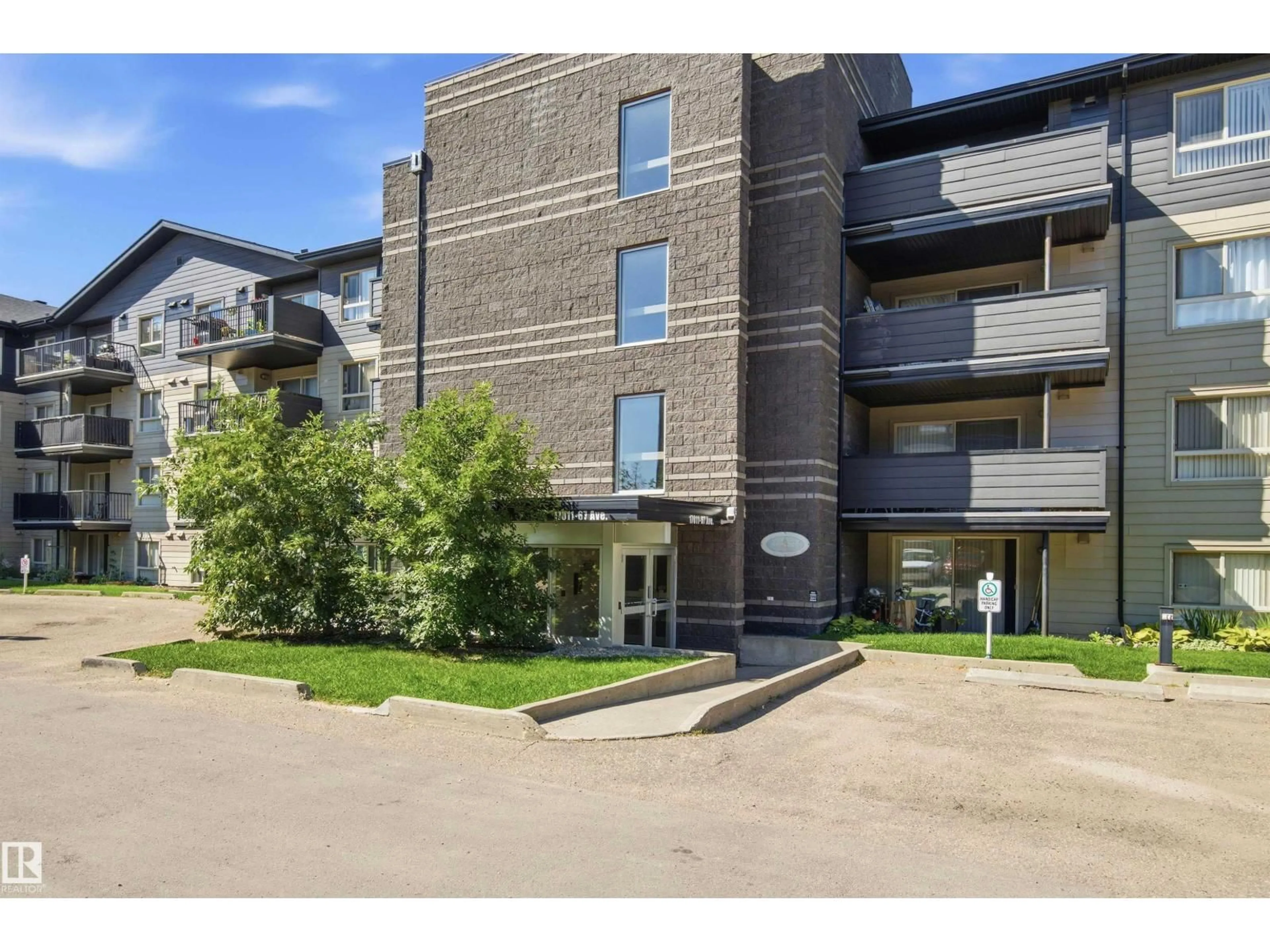 A pic from outside/outdoor area/front of a property/back of a property/a pic from drone, unknown for 117 - 17011 67 AV NW, Edmonton Alberta T5T6Y6