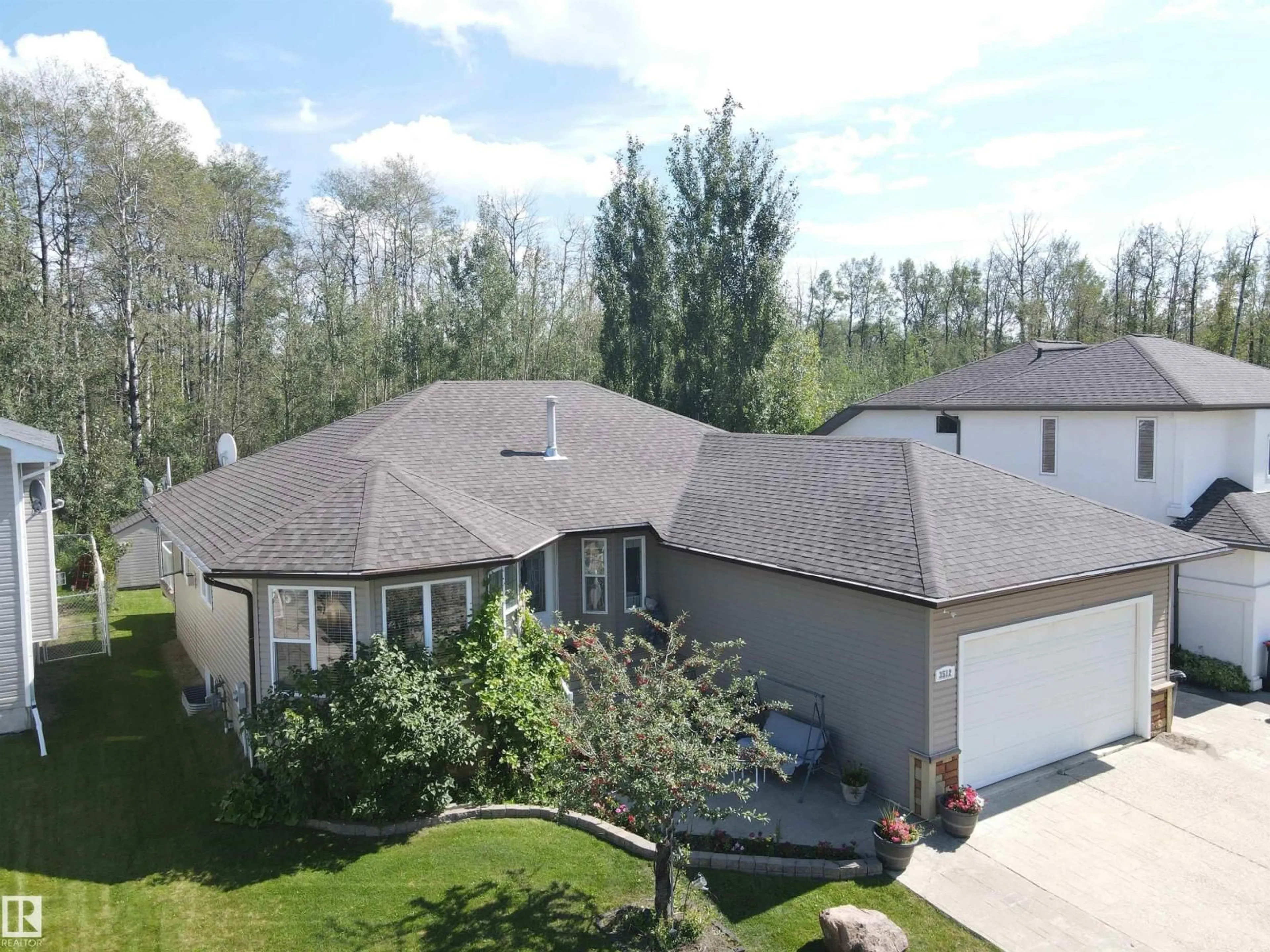 A pic from outside/outdoor area/front of a property/back of a property/a pic from drone, street for 3512 45 ST, Drayton Valley Alberta T7A1W3