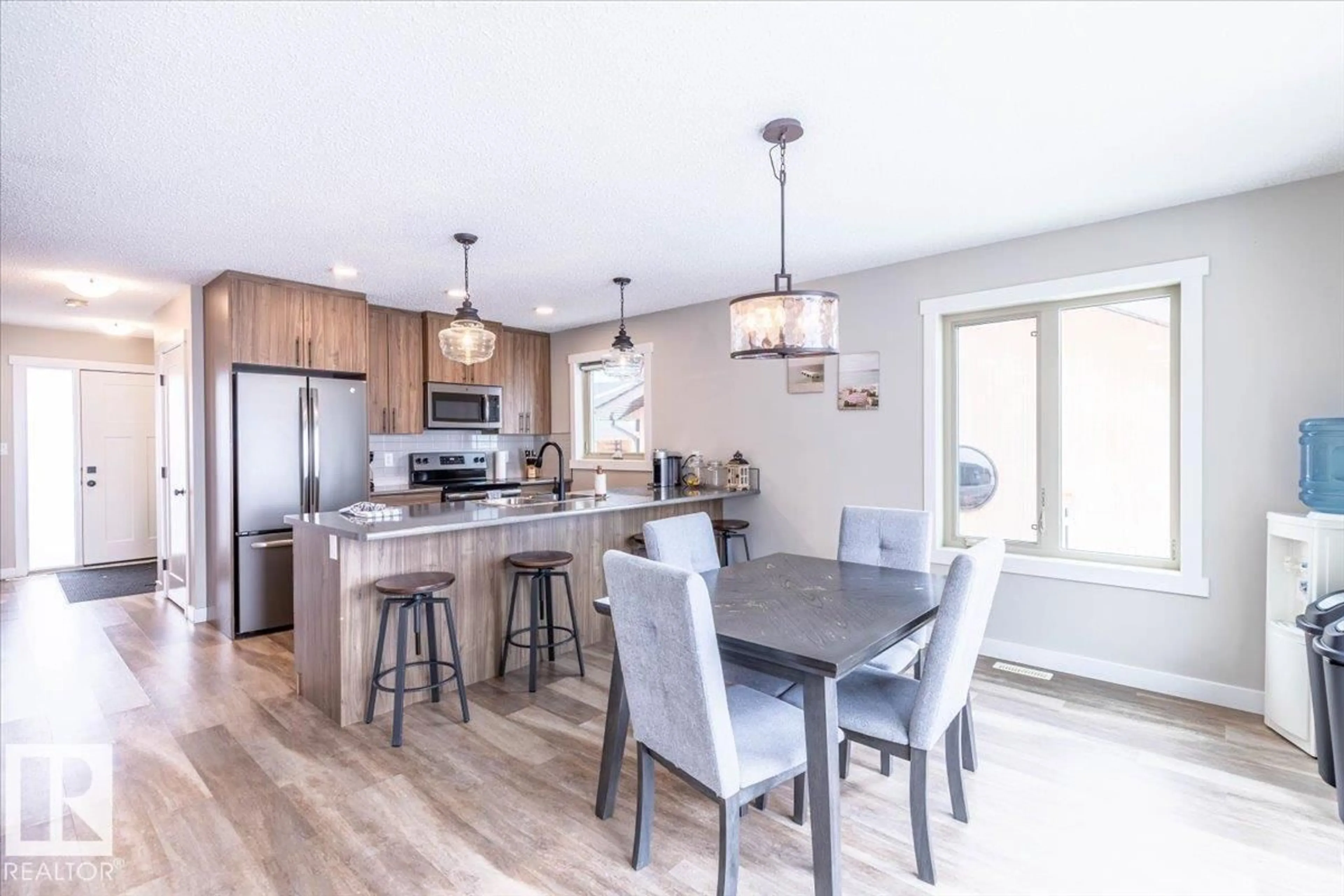 Open concept kitchen, wood/laminate floor for 33 LAKESHORE DR, Rural Wetaskiwin County Alberta T0C2V0