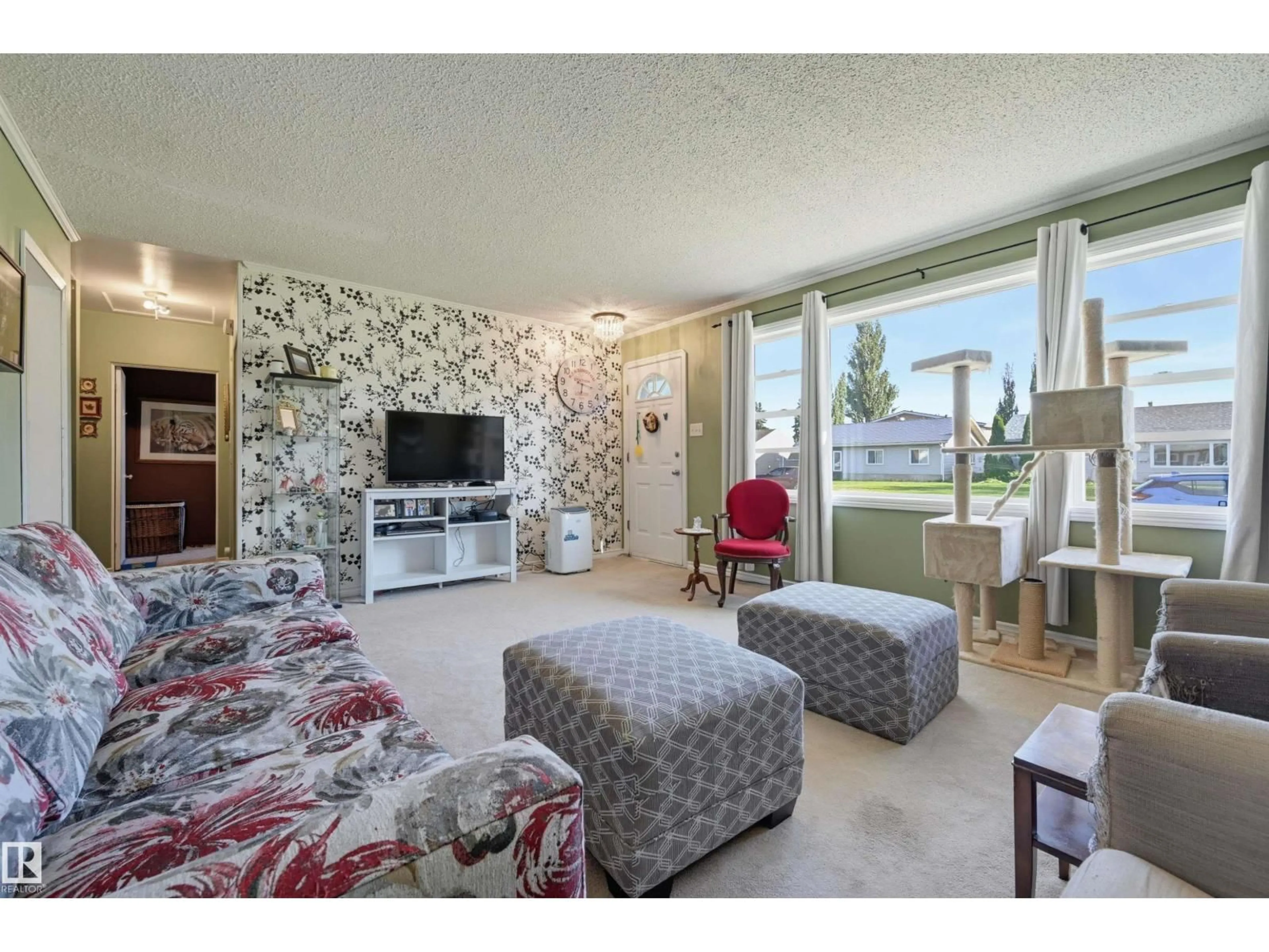 Living room with furniture, unknown for NW - 16112 108 AV, Edmonton Alberta T5P4E4
