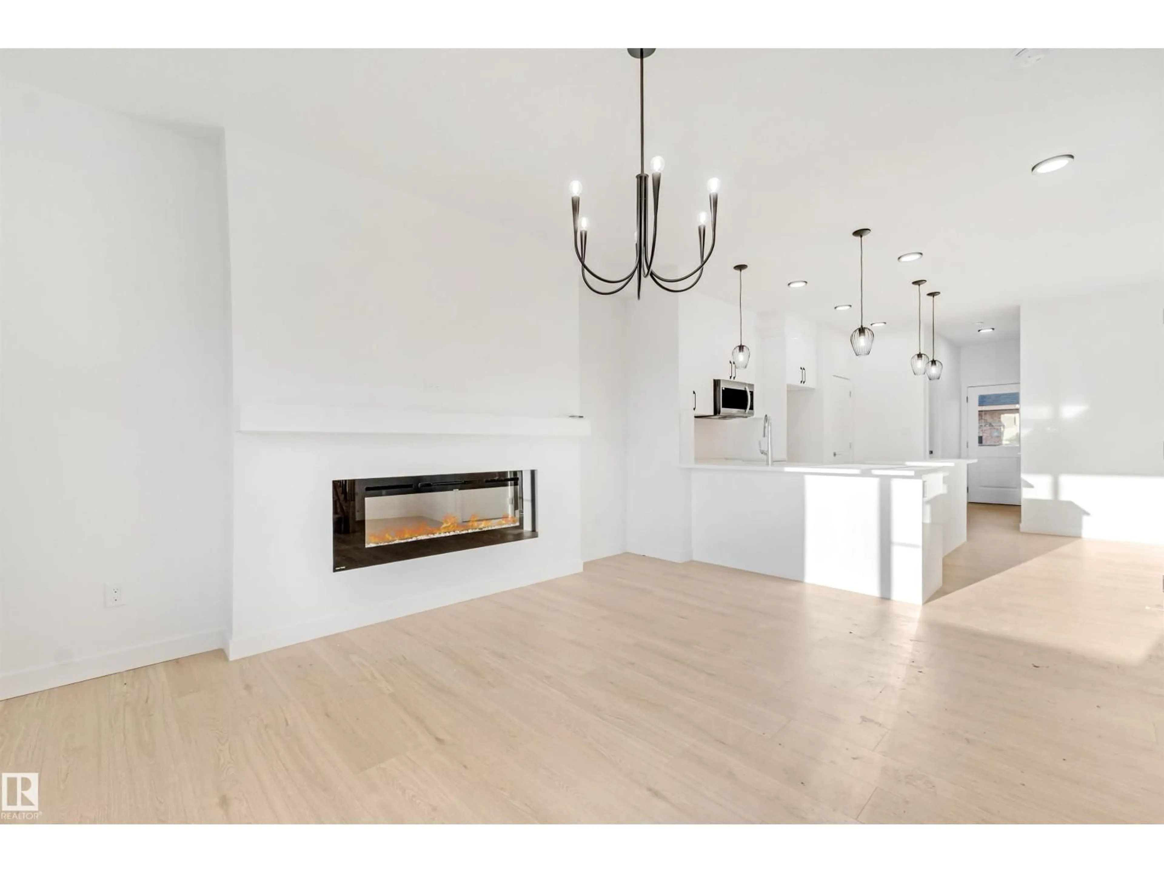 Open concept kitchen, wood/laminate floor for NW - 1519 211 STREET, Edmonton Alberta T6M3P2