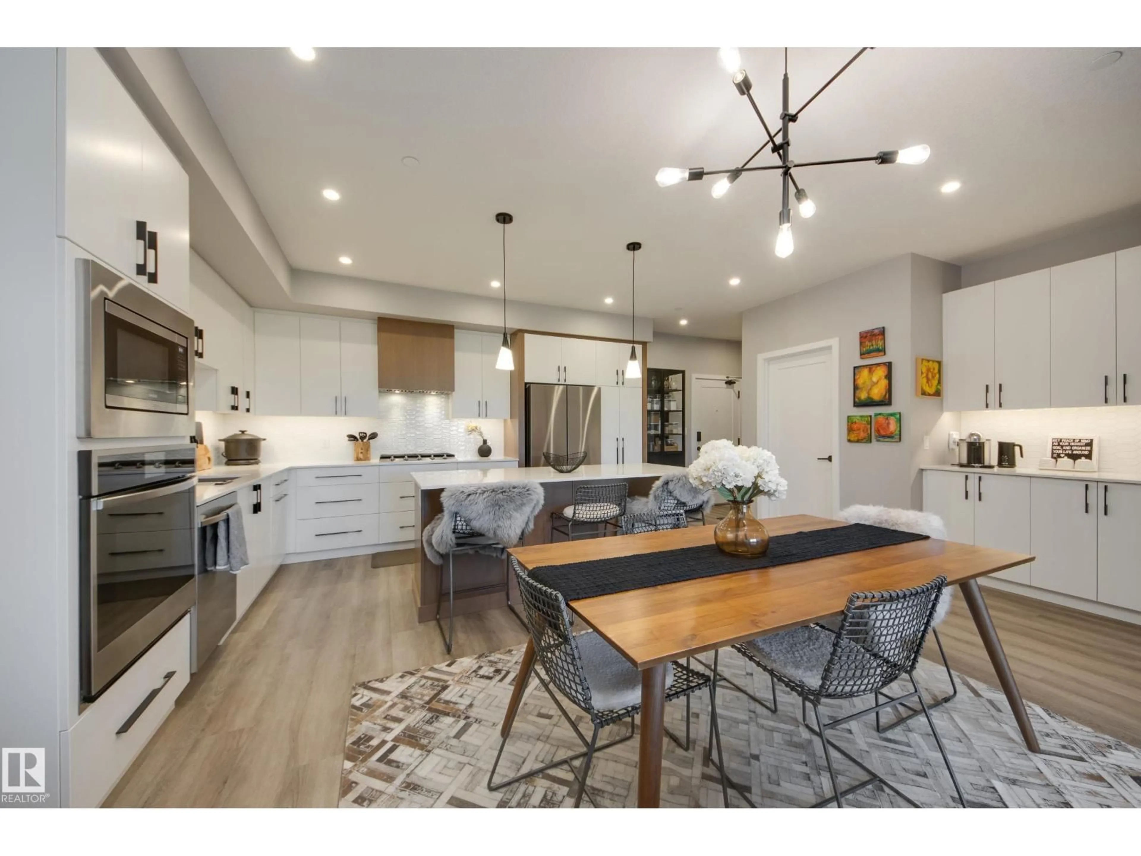 Open concept kitchen, unknown for #312 - 7471 MAY CM, Edmonton Alberta T6X1E9