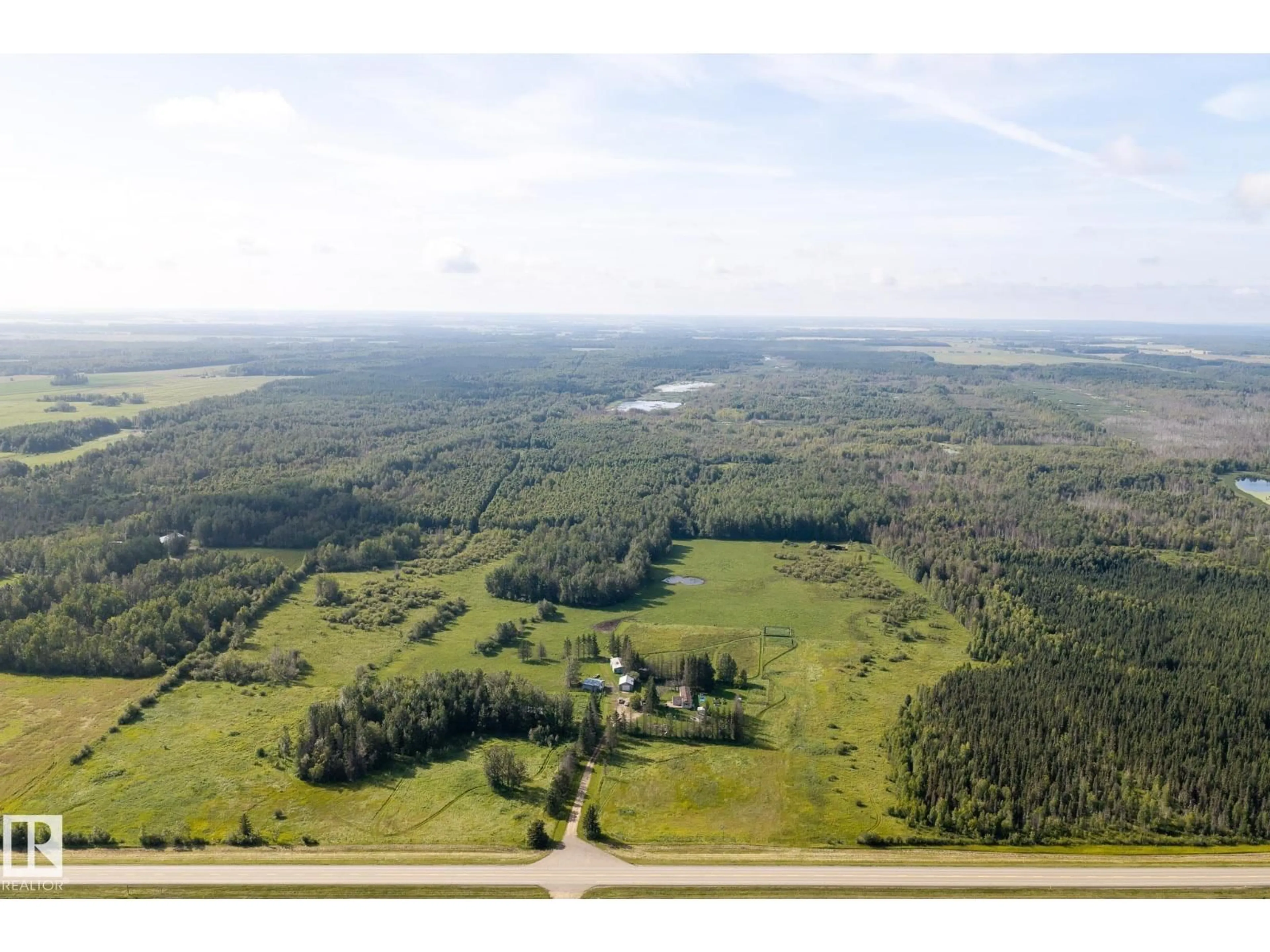 A pic from outside/outdoor area/front of a property/back of a property/a pic from drone, forest/trees view for 214067 HWY 55, Rural Athabasca County Alberta T9S1V7