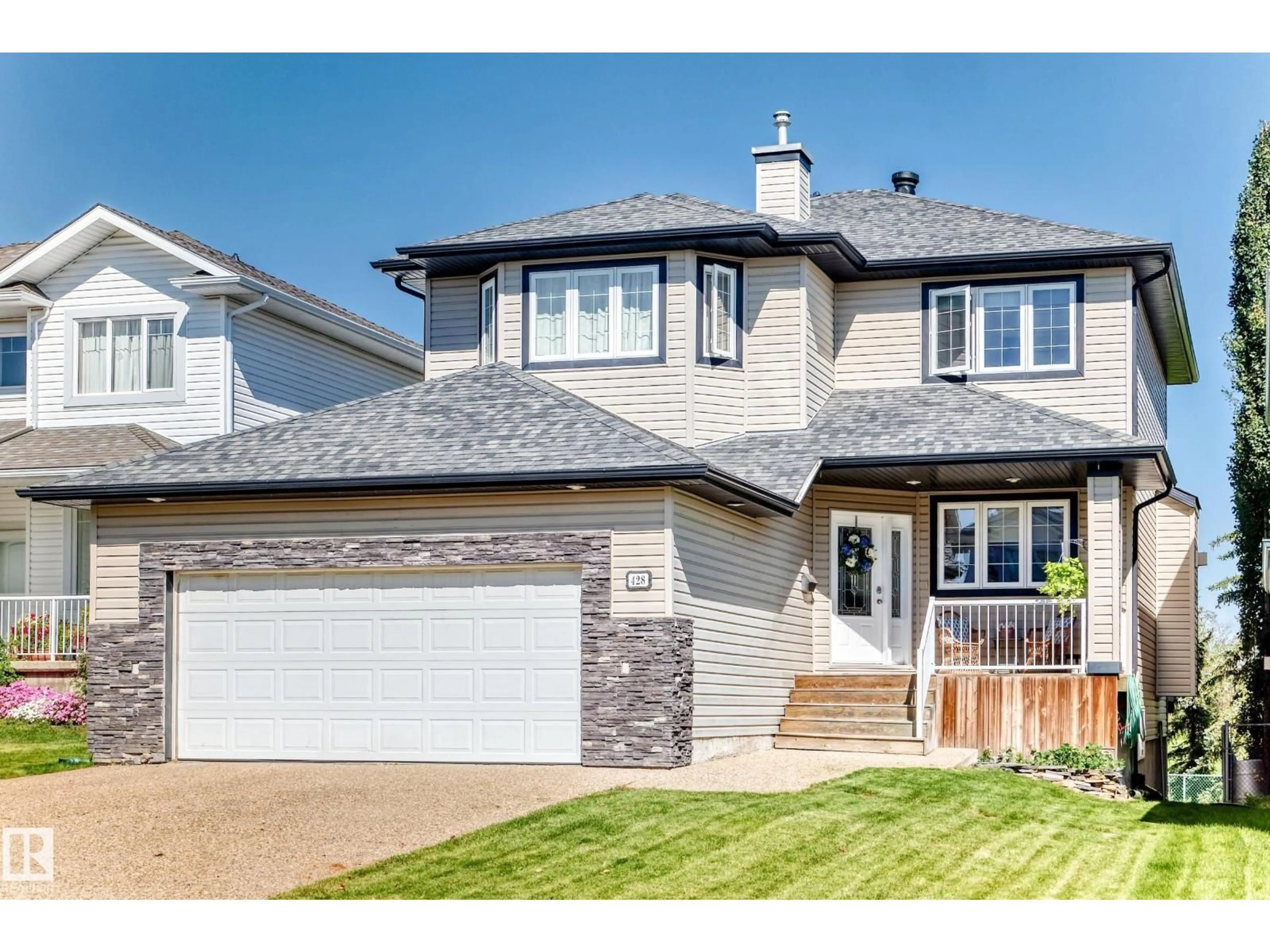 Home with vinyl exterior material, street for 428 FORREST DR, Sherwood Park Alberta T8A6L2