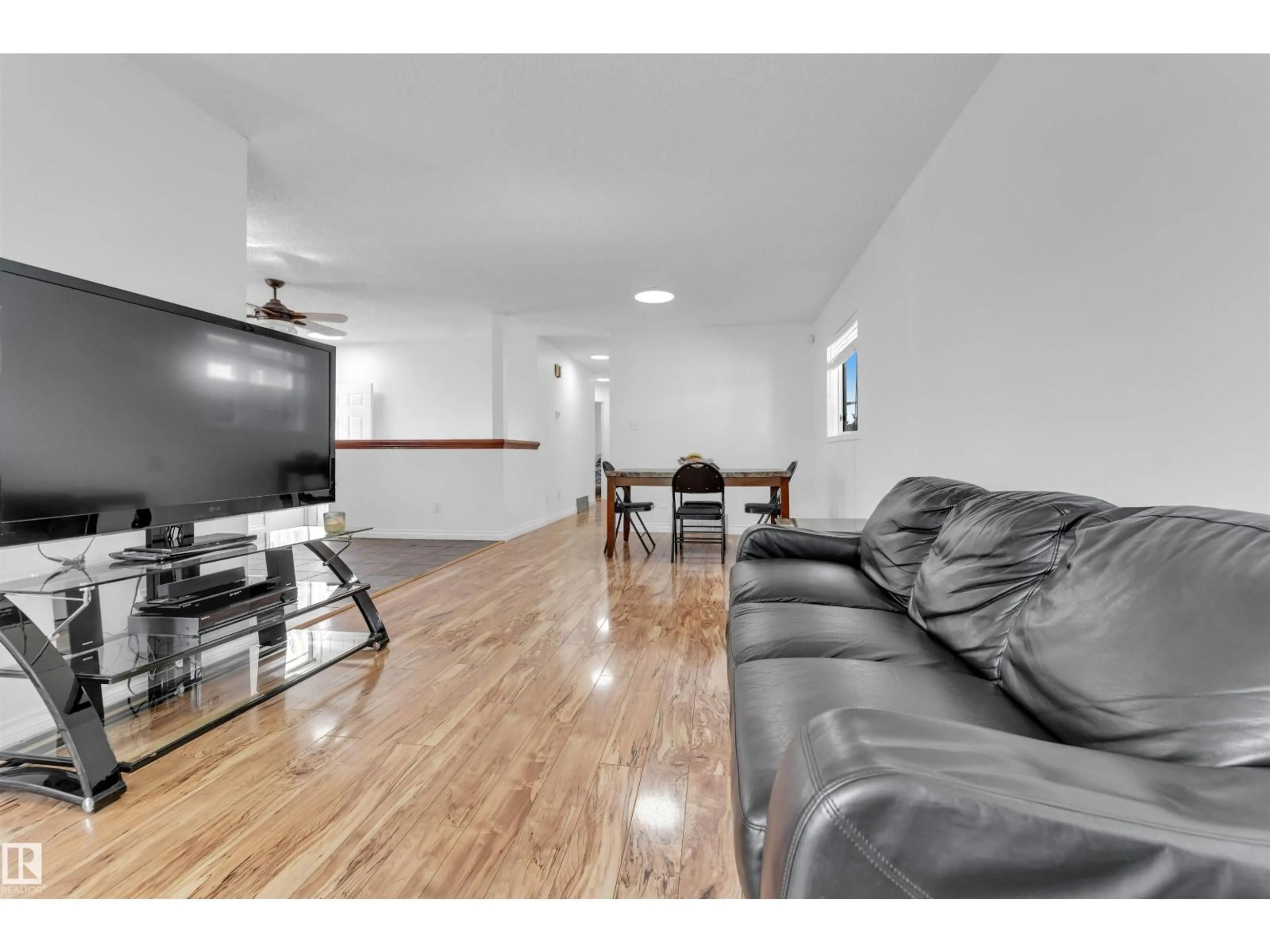 Living room with furniture, wood/laminate floor for 274 KIRKWOOD AV, Edmonton Alberta T6L5A8