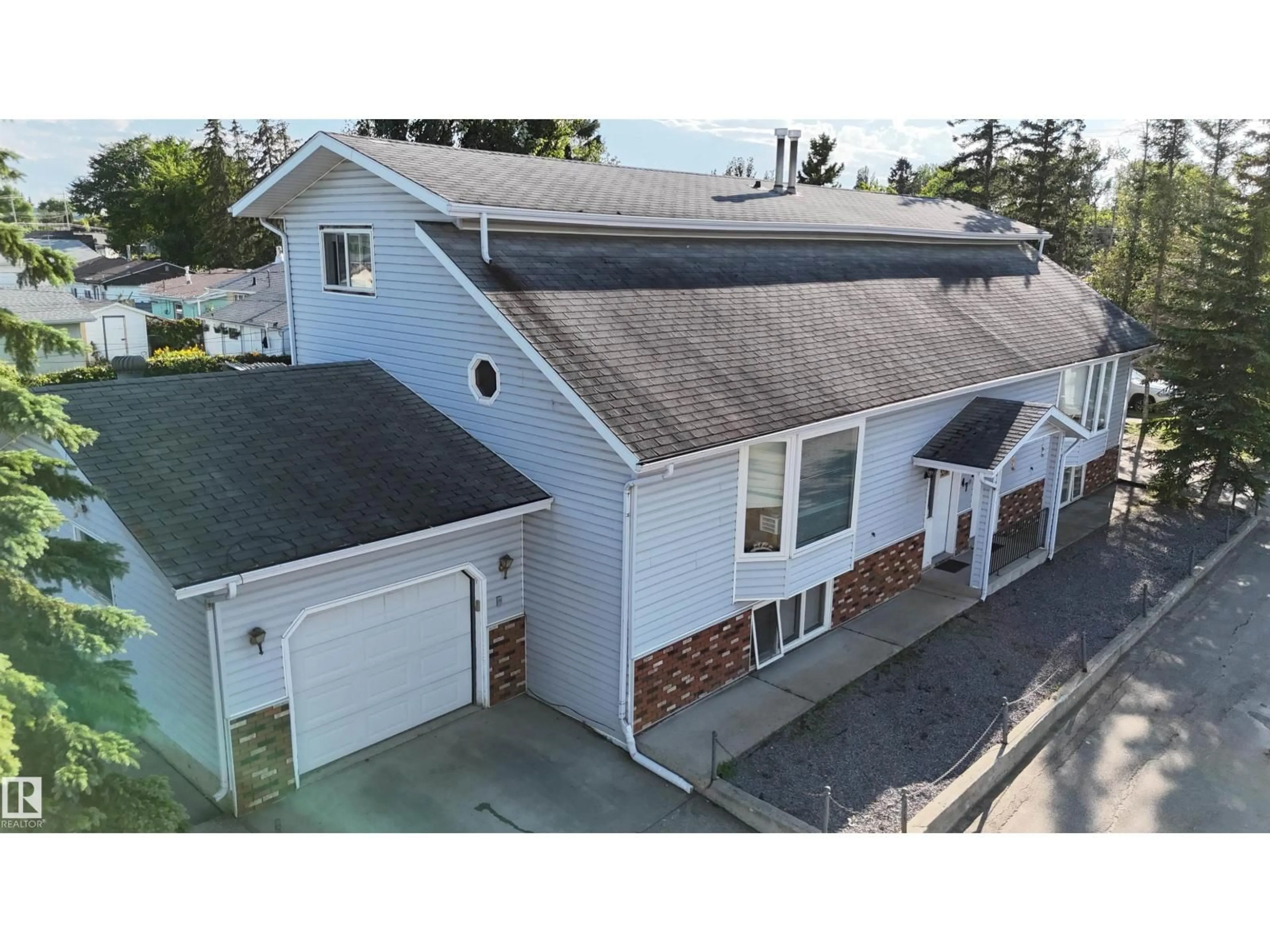 A pic from outside/outdoor area/front of a property/back of a property/a pic from drone, street for 4805 47 ST, Drayton Valley Alberta T7A1H8