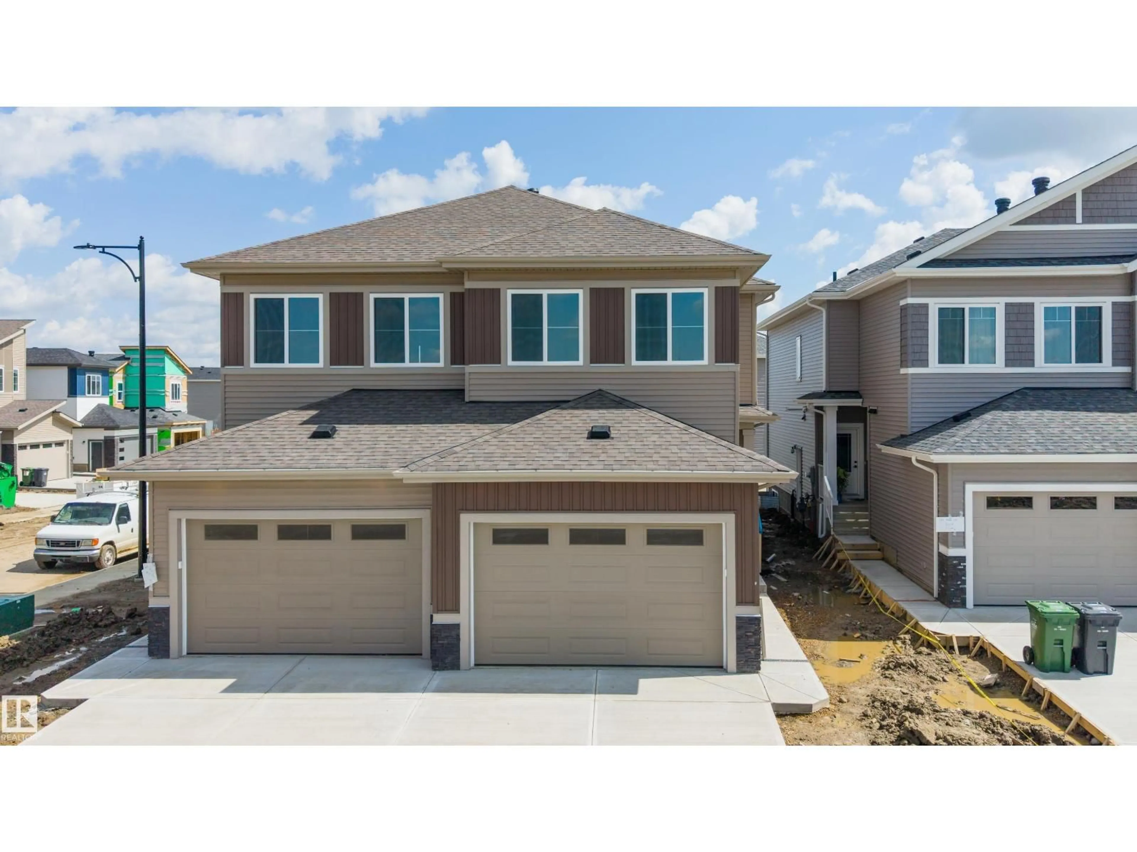 Home with vinyl exterior material, street for 153 MUNN WY, Leduc Alberta T5Y4M9