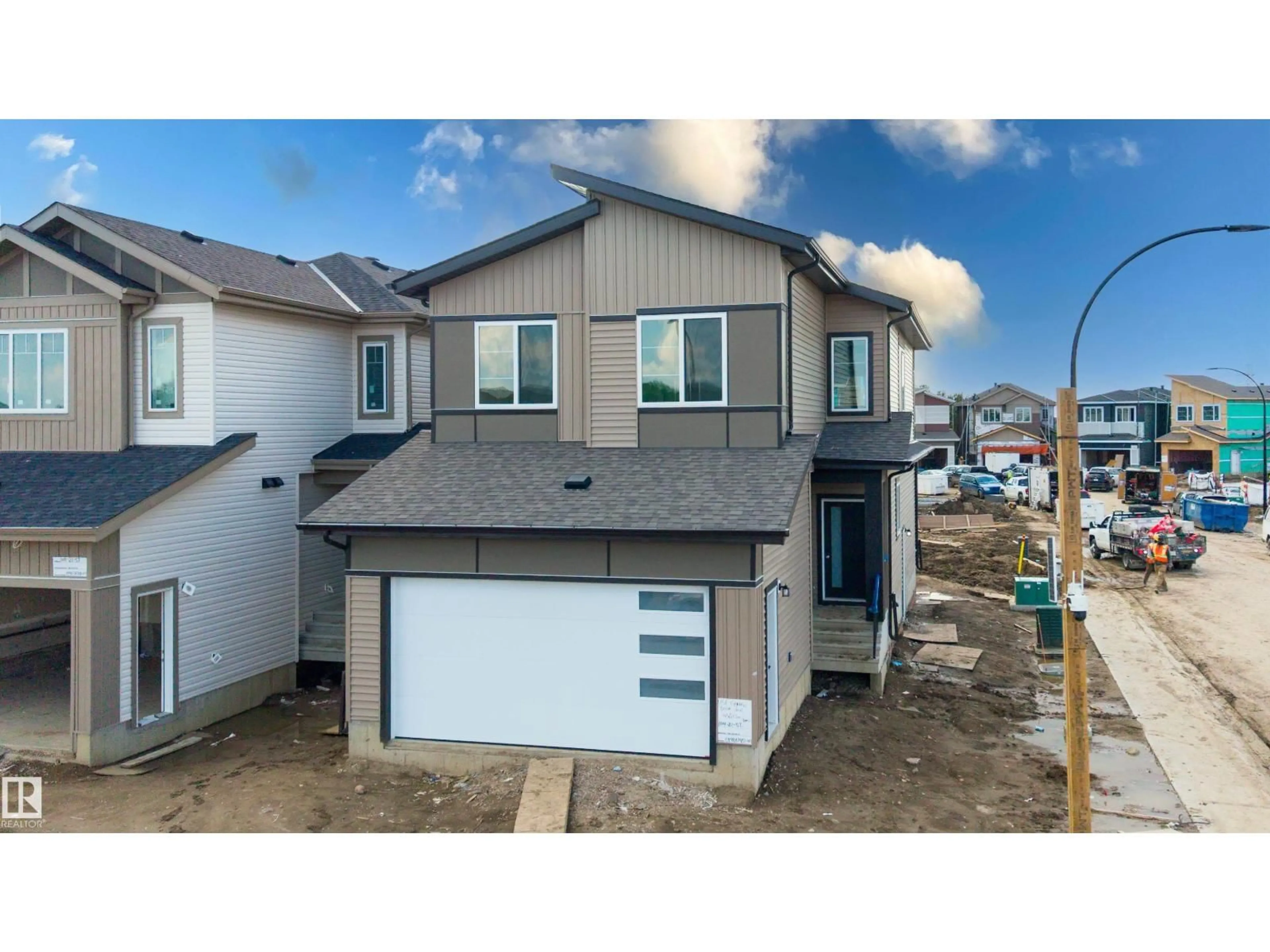 Home with vinyl exterior material, street for SW - 104 21 ST, Edmonton Alberta T6X0B5