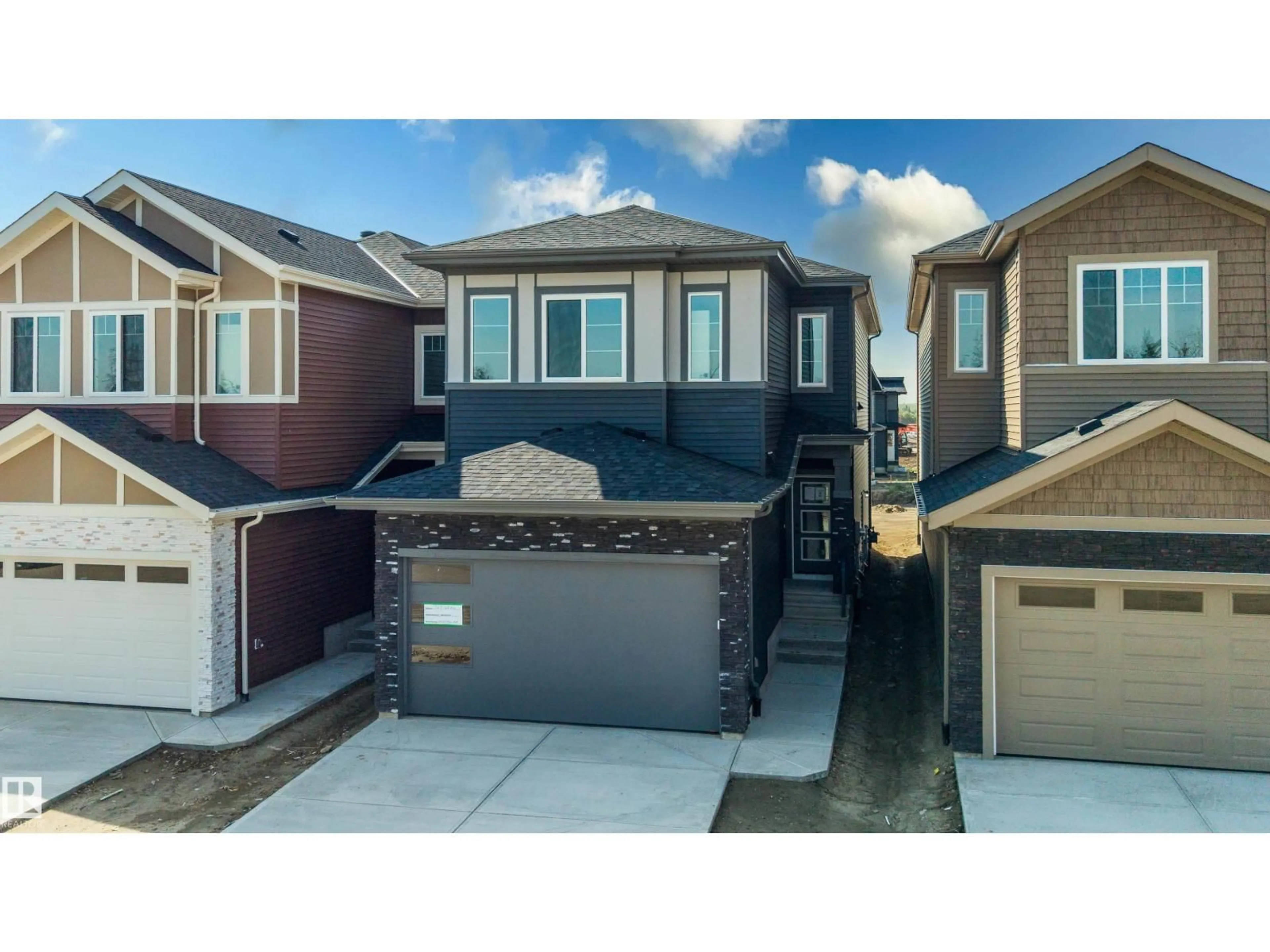 Home with vinyl exterior material, street for NE - 727 158 AV, Edmonton Alberta T5Y4M9