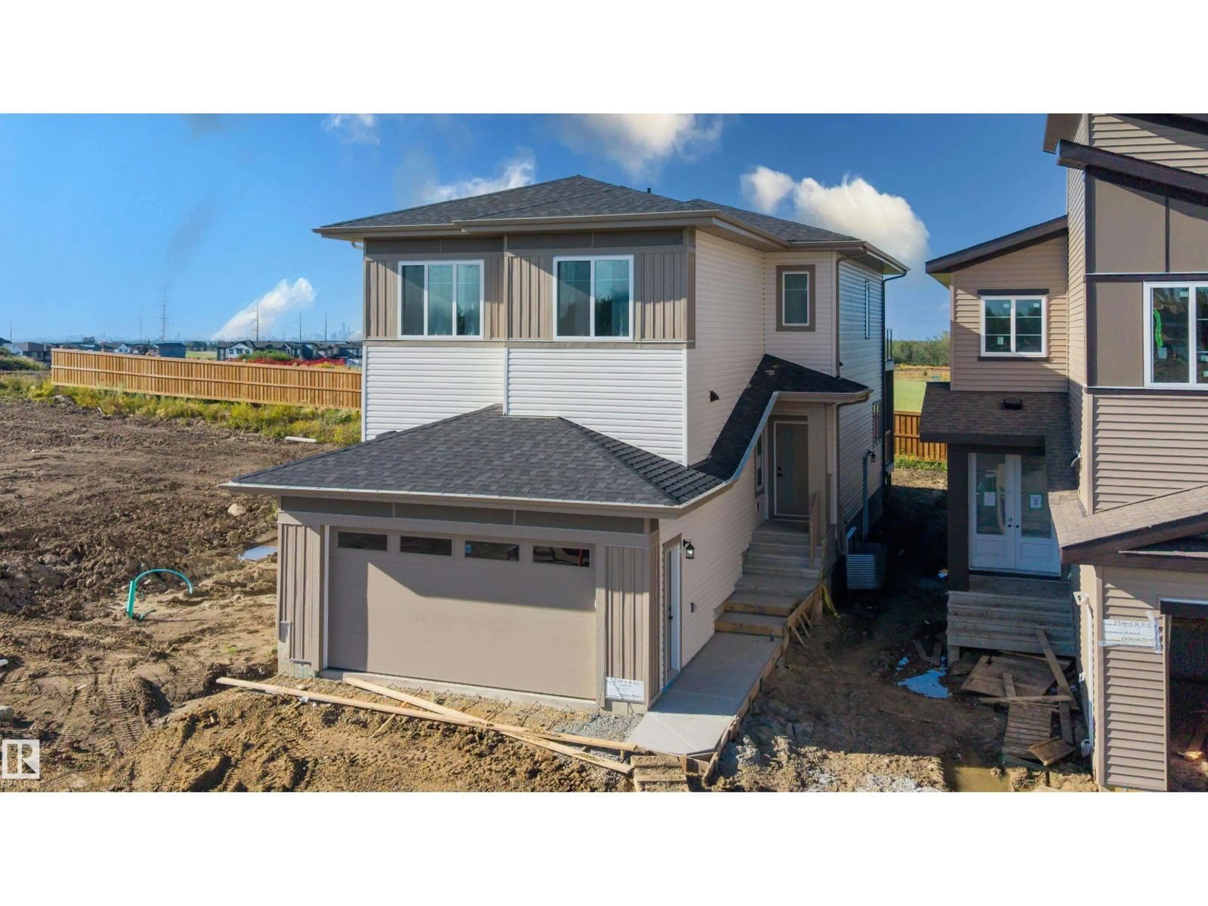 Home with vinyl exterior material, street for SW - 2318 6A AV, Edmonton Alberta T6X3E8