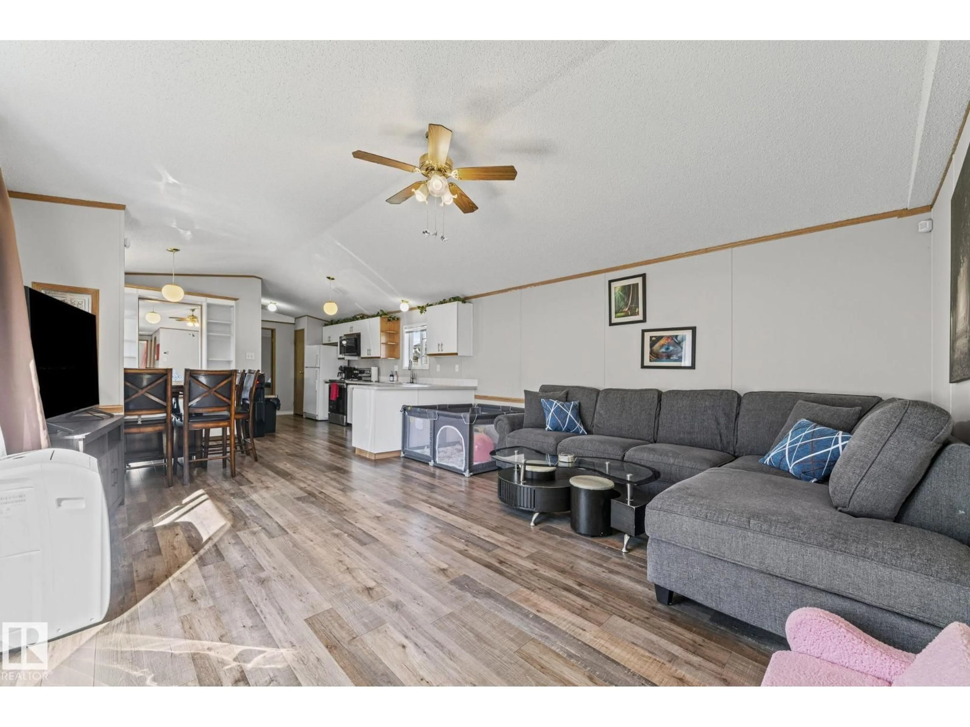Living room with furniture, wood/laminate floor for 89 SPRINGFIELD CR, Spruce Grove Alberta T7X3H9