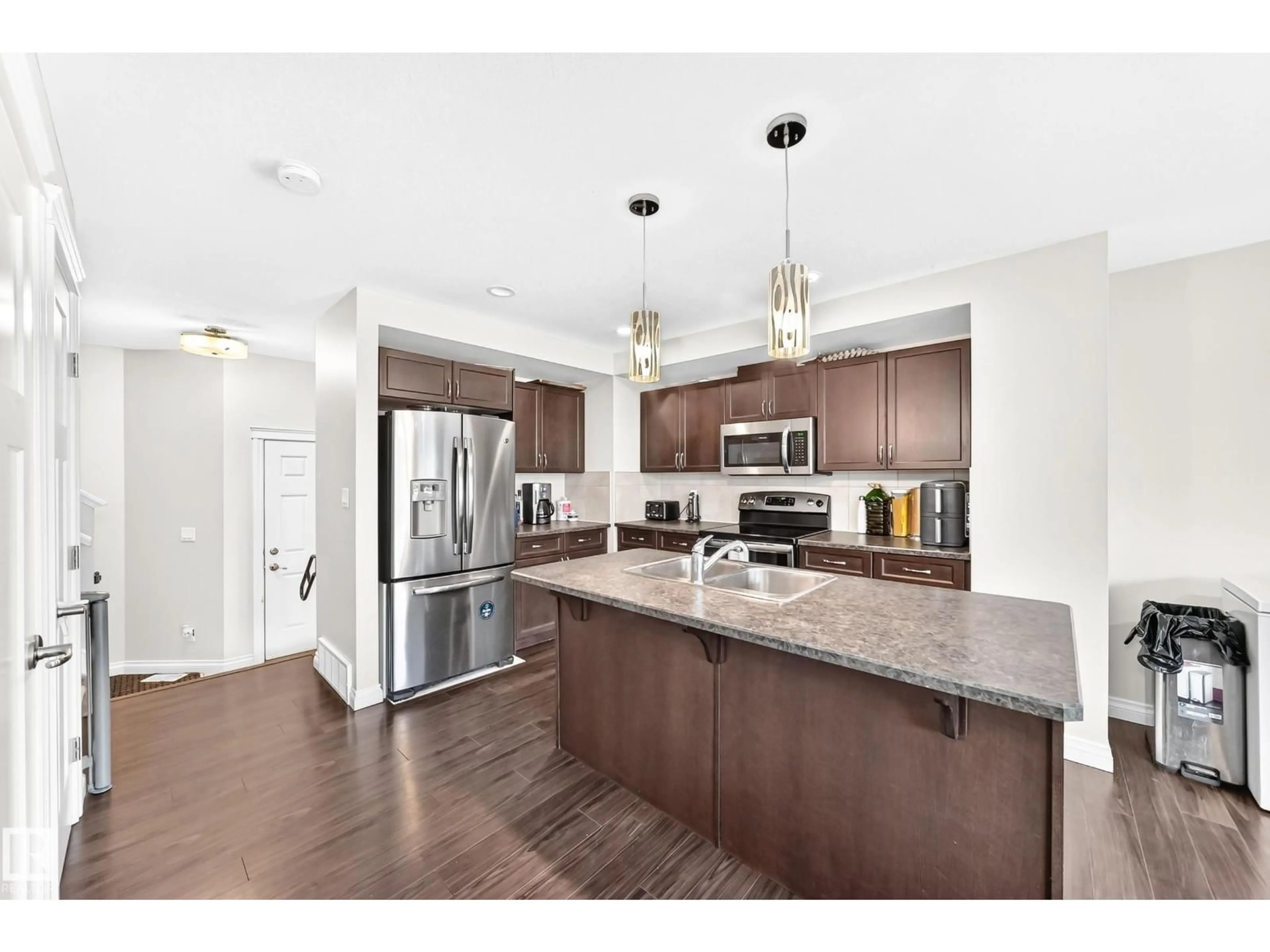 Open concept kitchen, unknown for 258 STURTZ BN, Leduc Alberta T9E0X4