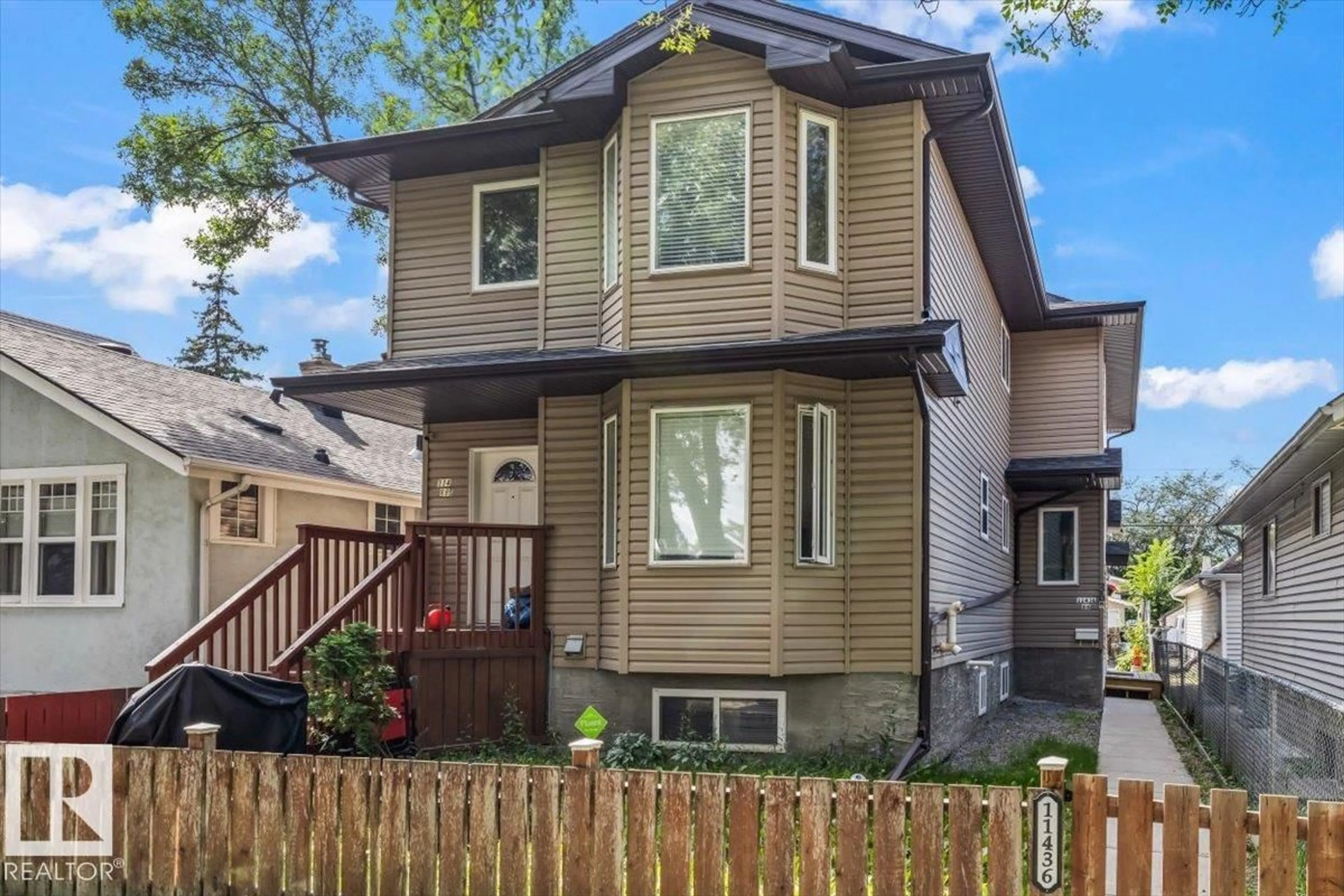 Home with vinyl exterior material, street for 11436 88 ST, Edmonton Alberta T5B3R1