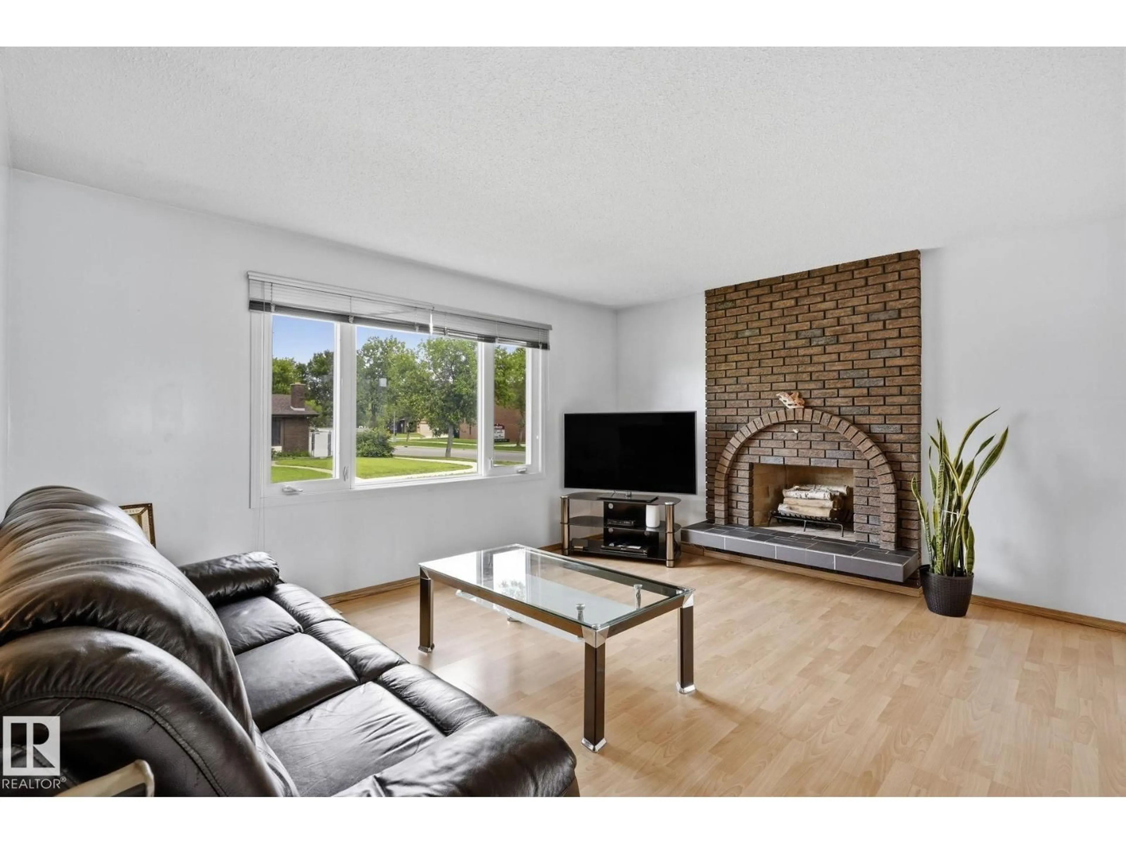 Living room with furniture, unknown for NW - 10007 168 AV, Edmonton Alberta T5X2Z6