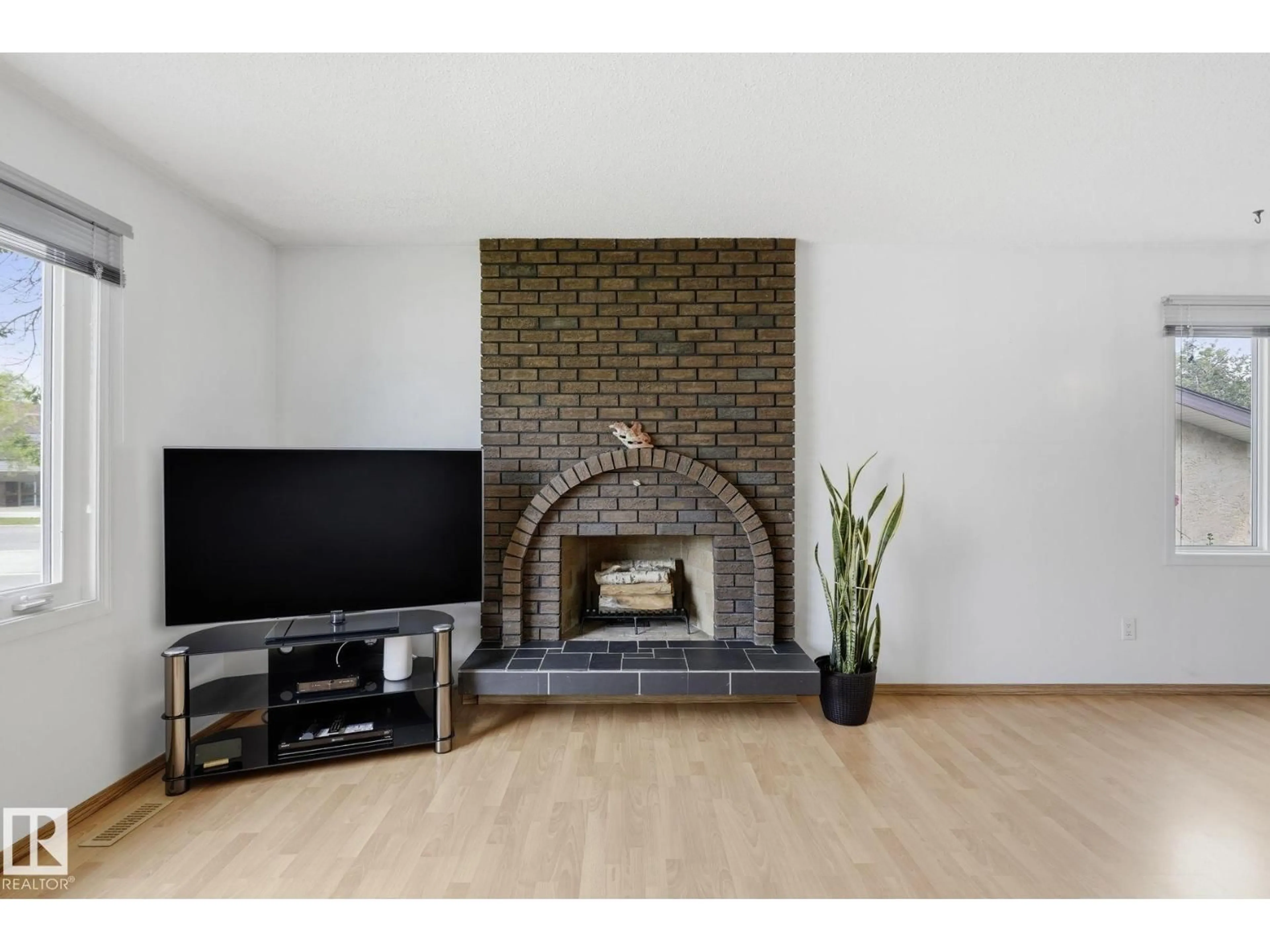 Living room with furniture, unknown for NW - 10007 168 AV, Edmonton Alberta T5X2Z6