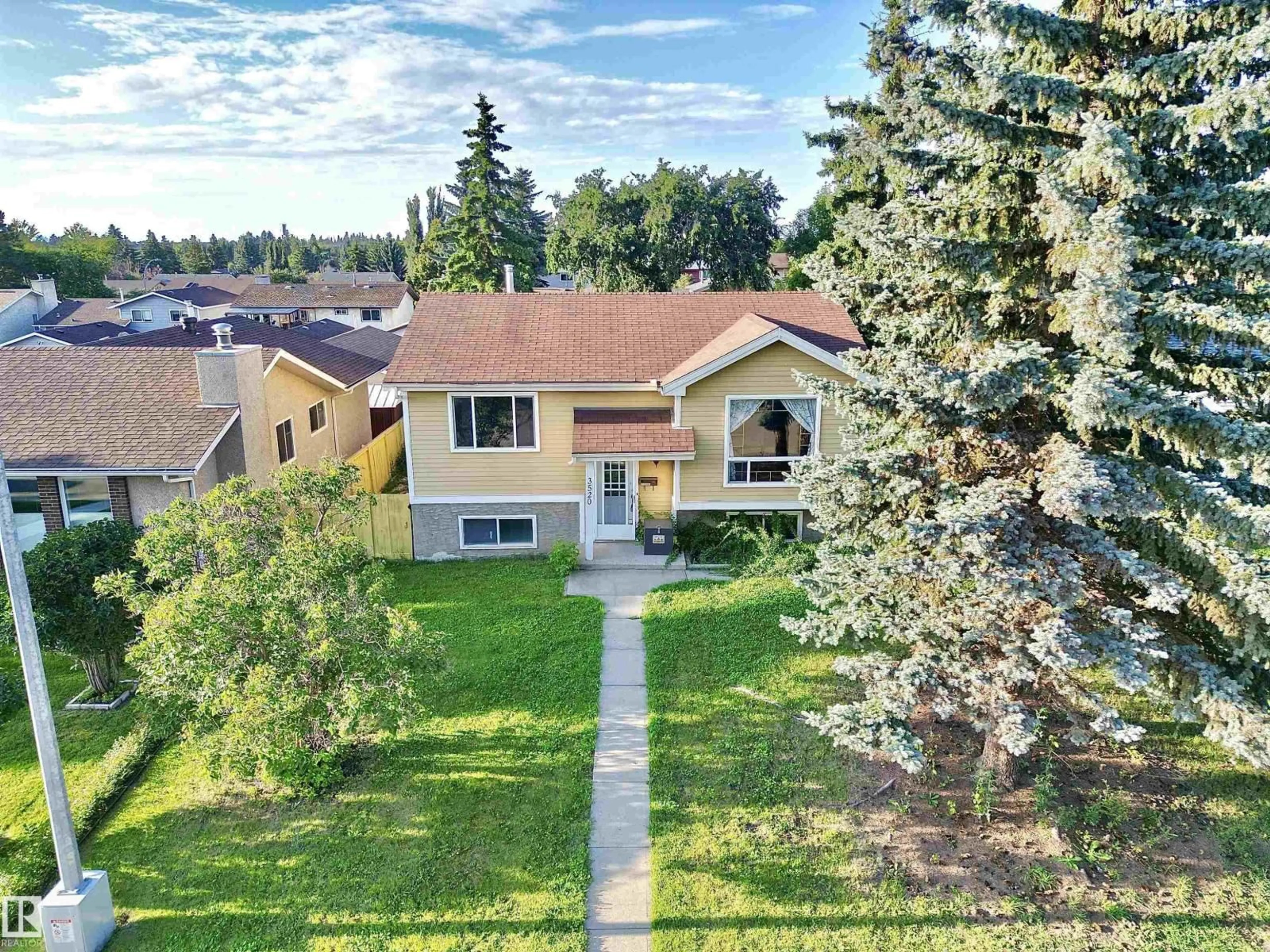 A pic from outside/outdoor area/front of a property/back of a property/a pic from drone, unknown for 3520 17B AV, Edmonton Alberta T6L2P3