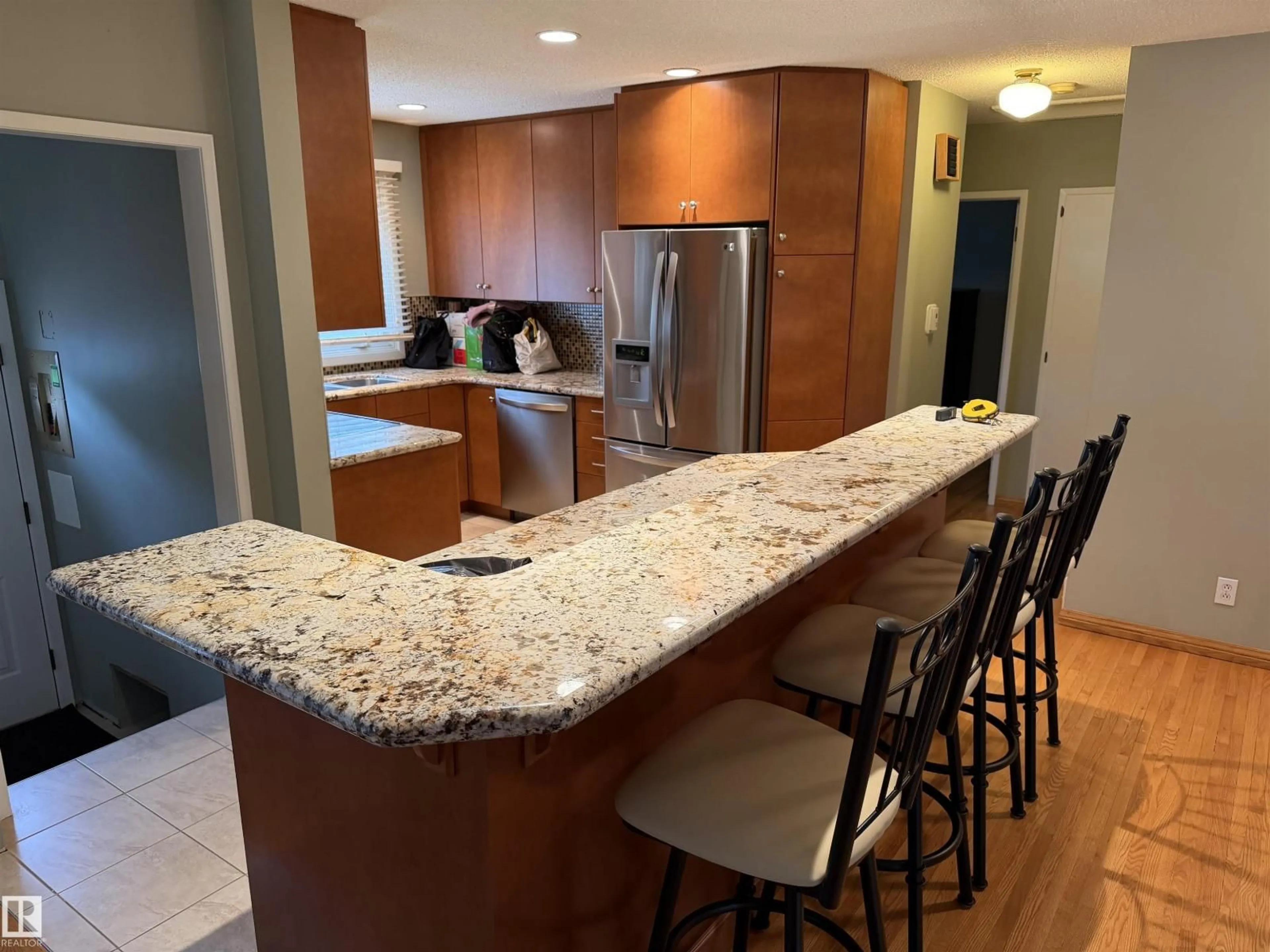 Open concept kitchen, ceramic/tile floor for 12124 51 ST, Edmonton Alberta T5W3G9