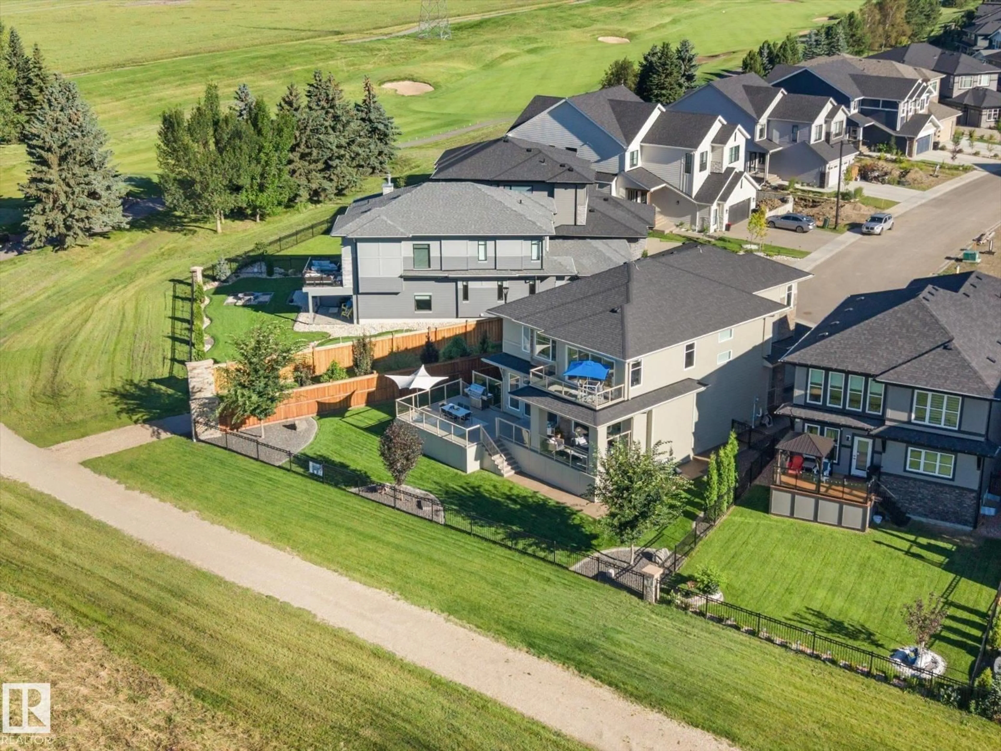 A pic from outside/outdoor area/front of a property/back of a property/a pic from drone, mountain view for SW - 1558 HOWES PL, Edmonton Alberta T6W5C1