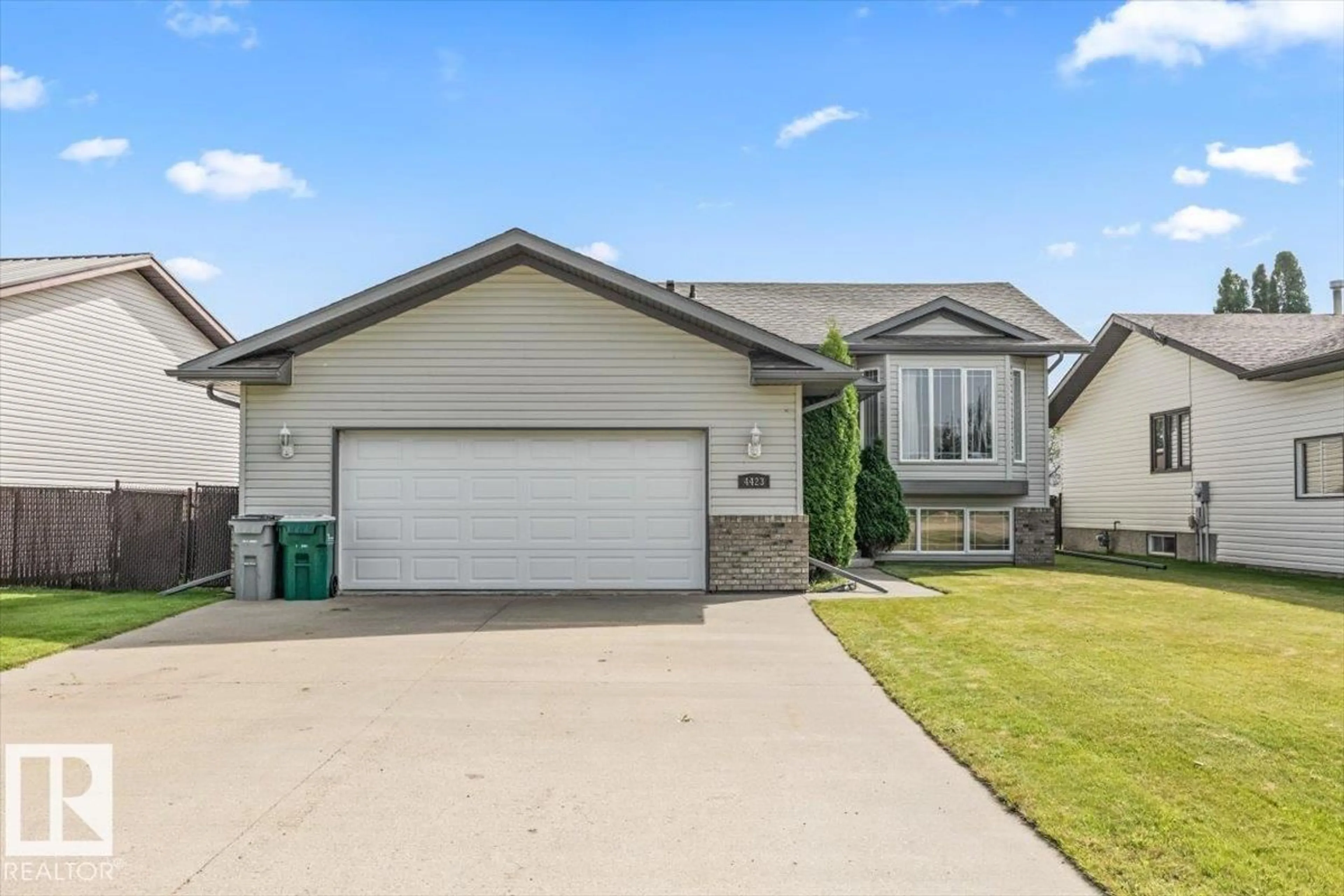 Home with vinyl exterior material, street for 4423 56 AV, Lamont Alberta T0B0B2