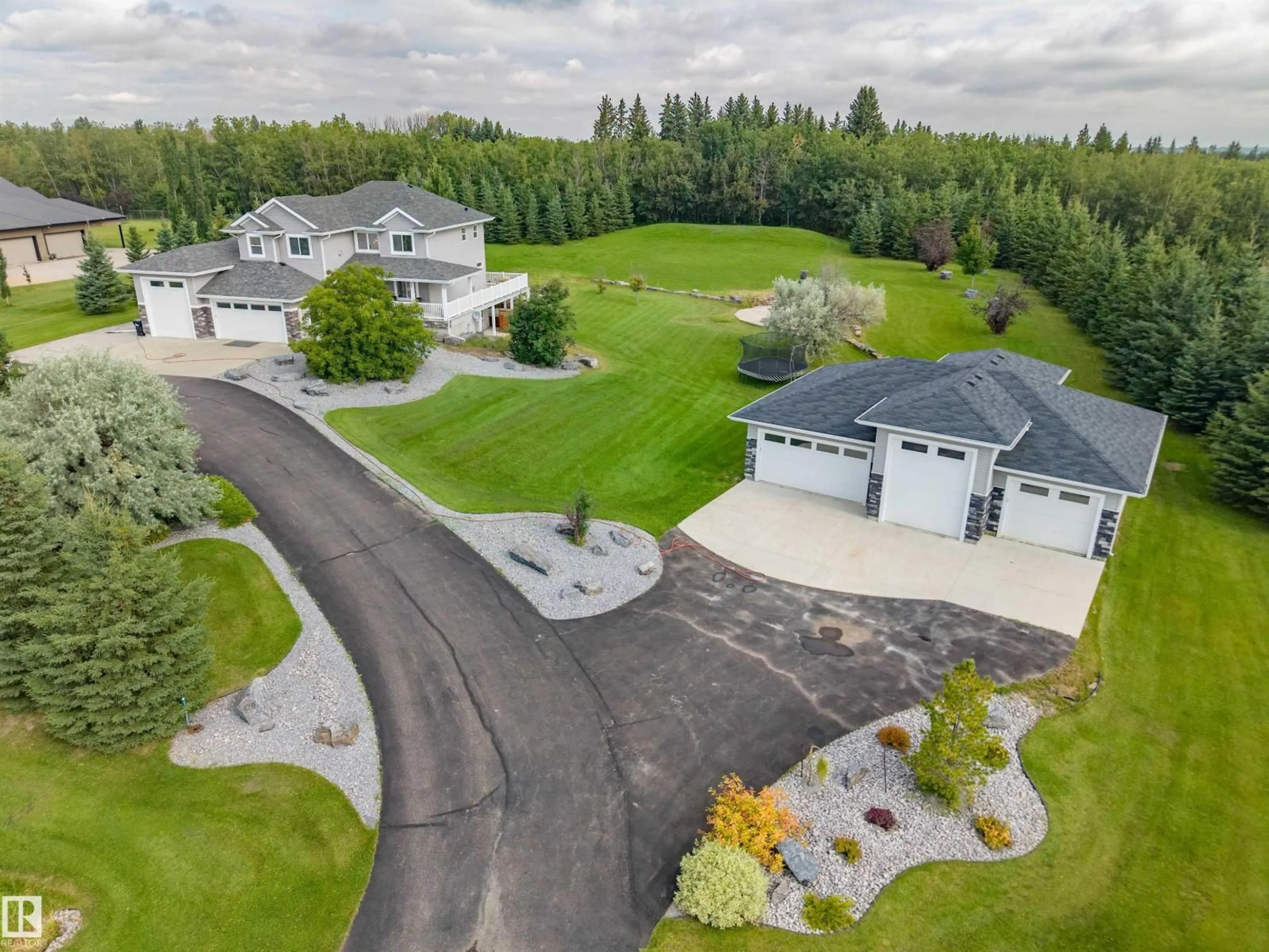 A pic from outside/outdoor area/front of a property/back of a property/a pic from drone, unknown for 170 53016 RGE ROAD 222, Rural Strathcona County Alberta T8E1J8