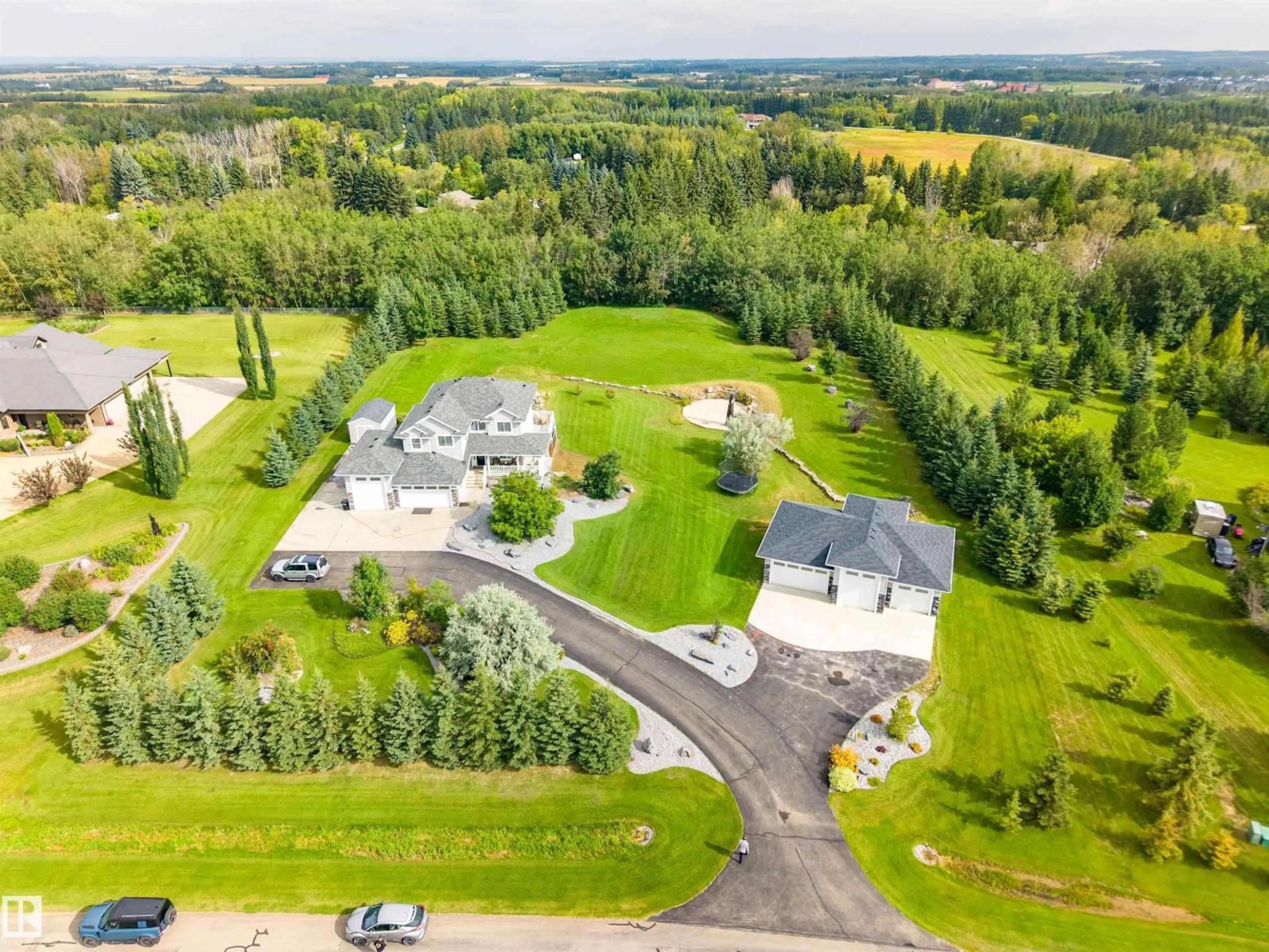 A pic from outside/outdoor area/front of a property/back of a property/a pic from drone, unknown for 170 53016 RGE ROAD 222, Rural Strathcona County Alberta T8E1J8