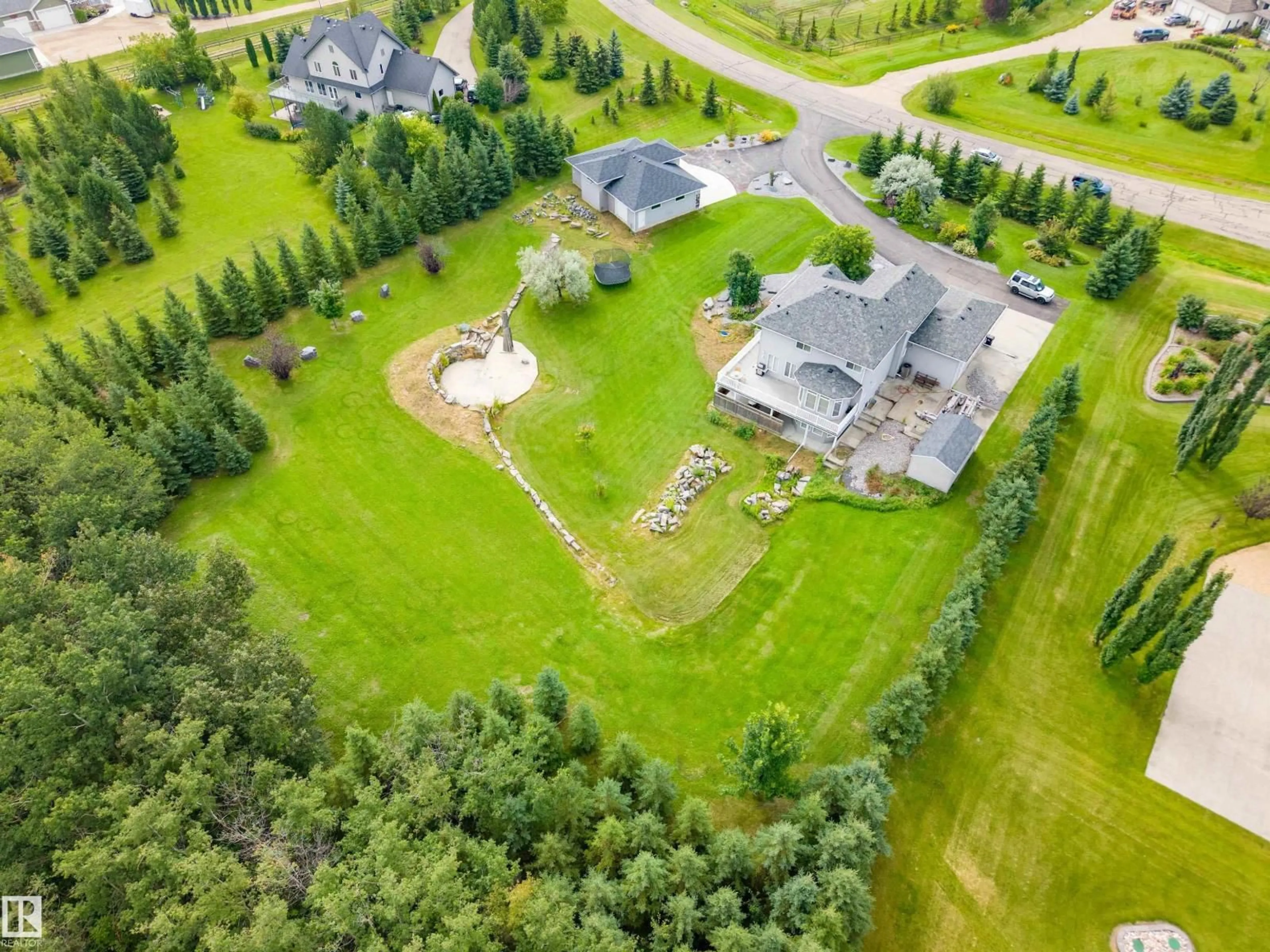 A pic from outside/outdoor area/front of a property/back of a property/a pic from drone, unknown for 170 53016 RGE ROAD 222, Rural Strathcona County Alberta T8E1J8