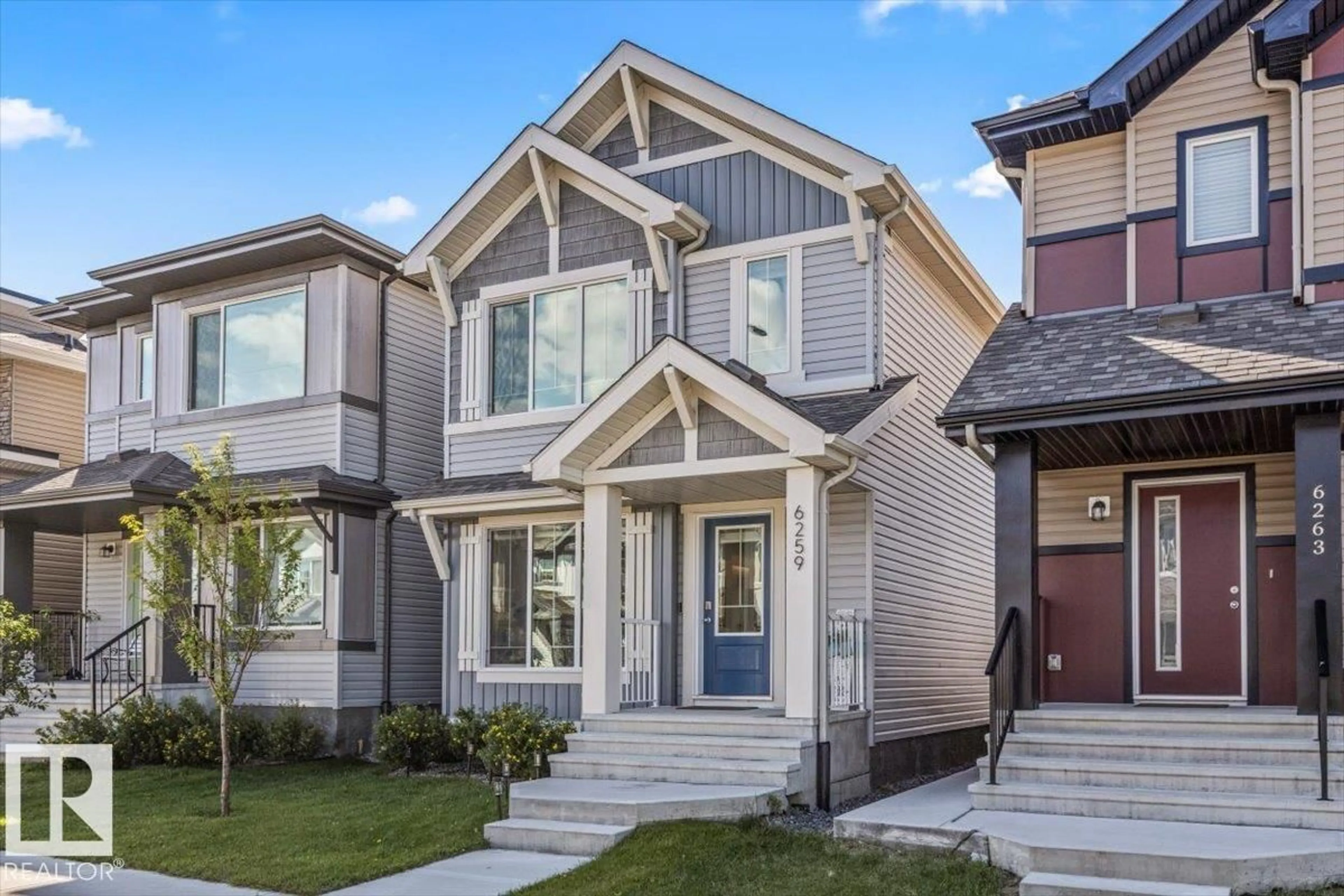 Home with vinyl exterior material, street for 6259 176 AV, Edmonton Alberta T5Y4E5