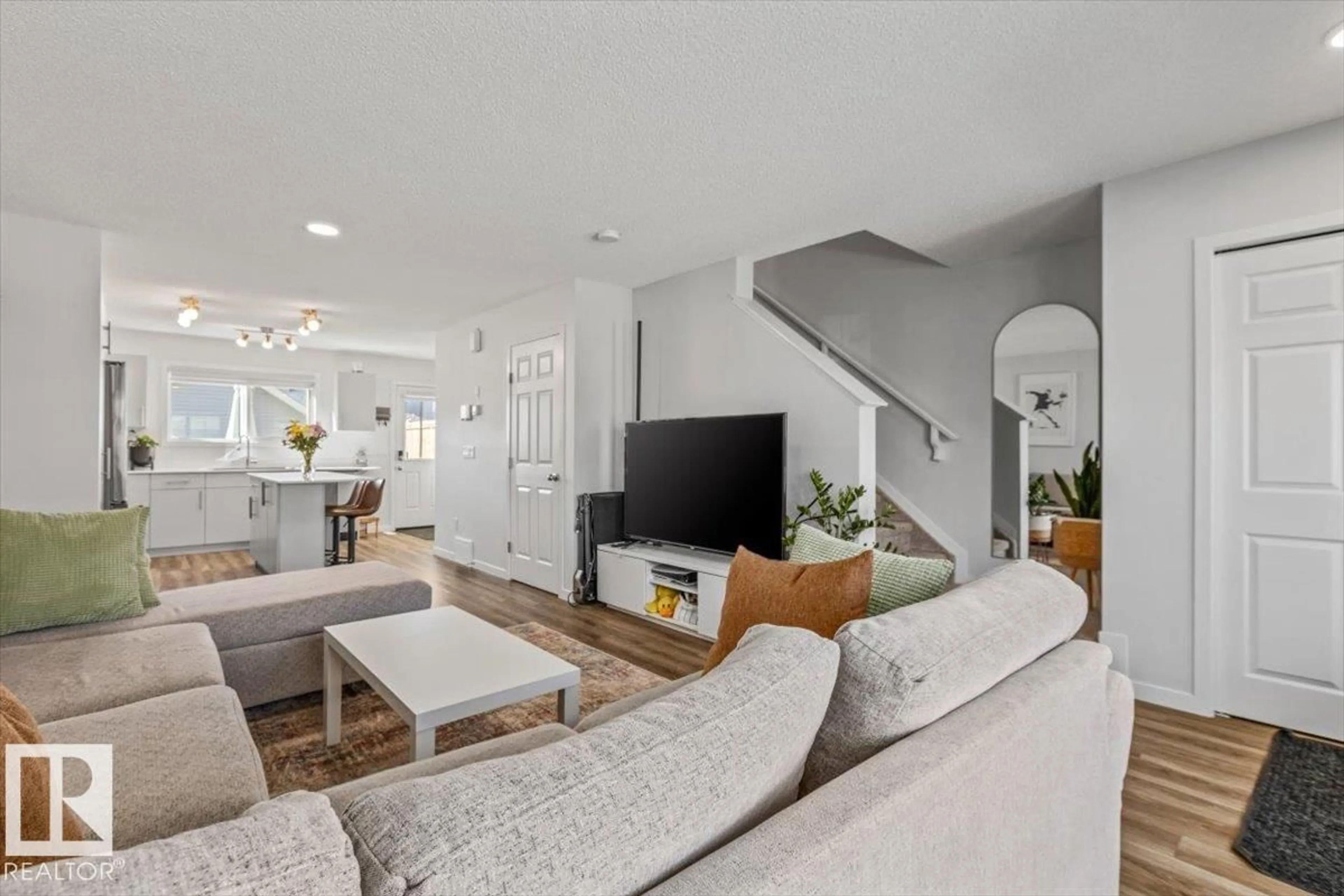 Living room with furniture, unknown for 6259 176 AV, Edmonton Alberta T5Y4E5
