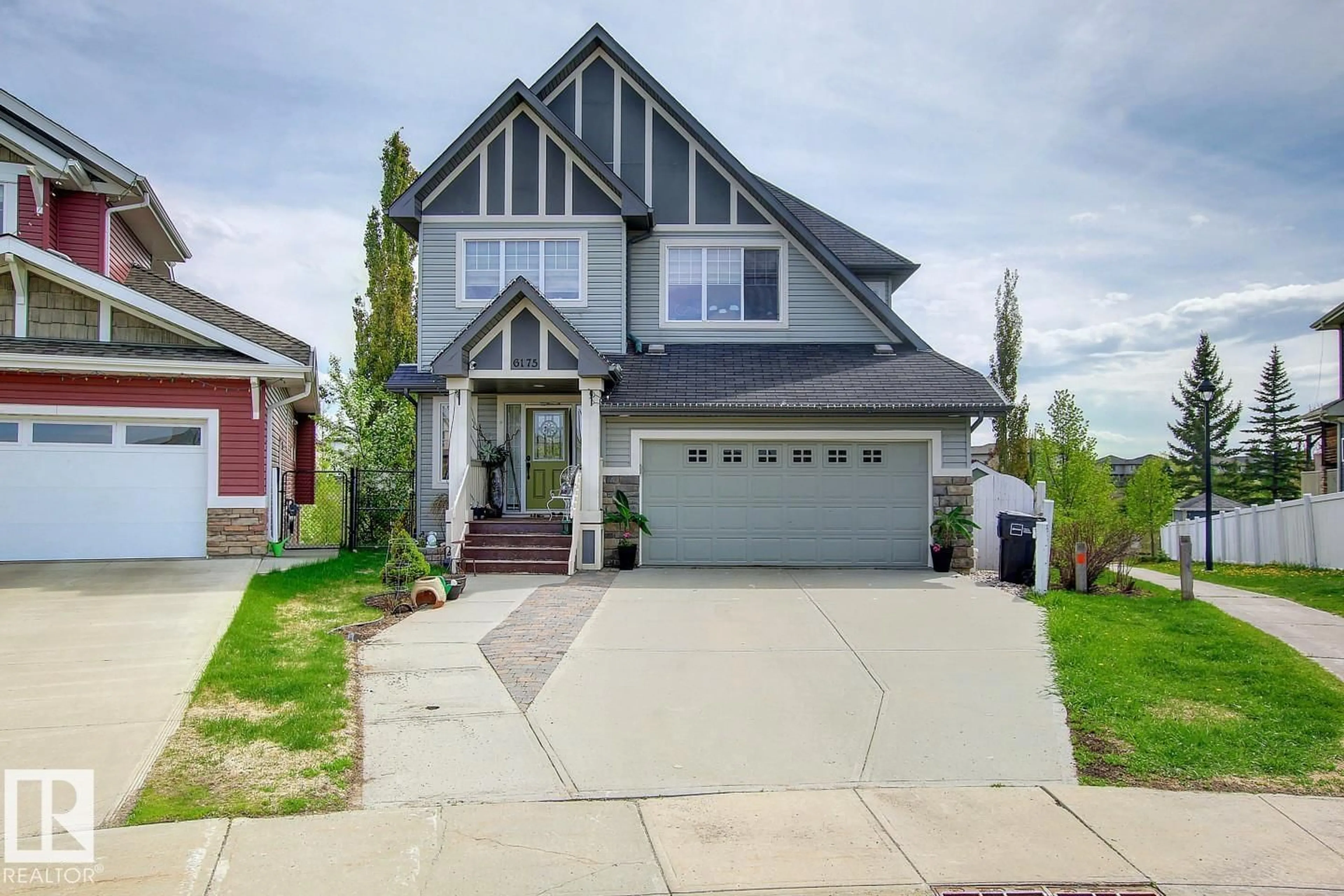 Home with vinyl exterior material, street for 6175 STINSON WY, Edmonton Alberta T6R0K3