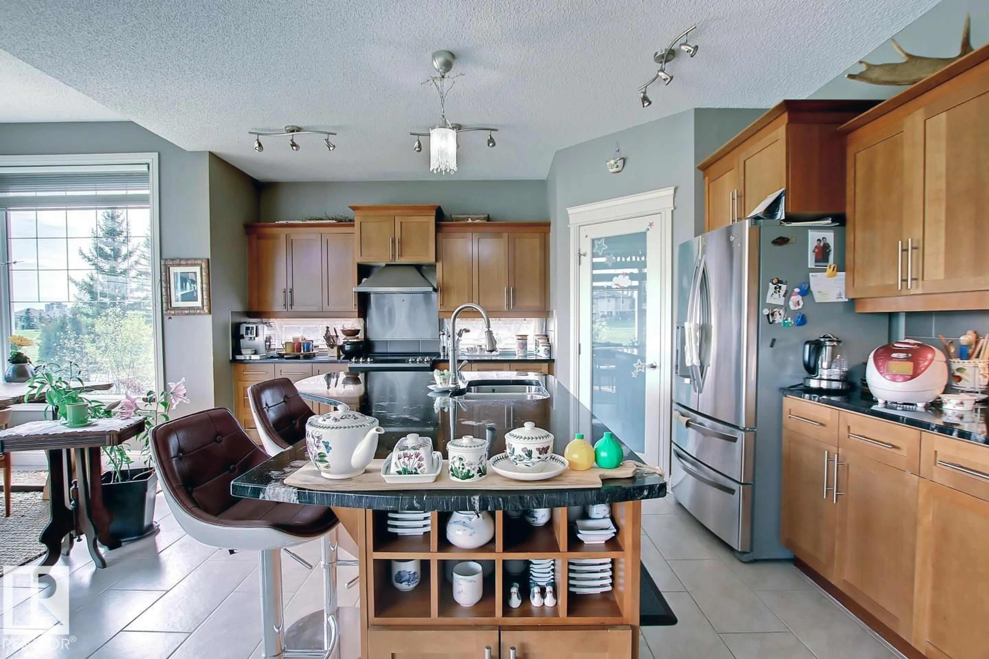 Open concept kitchen, ceramic/tile floor for 6175 STINSON WY, Edmonton Alberta T6R0K3