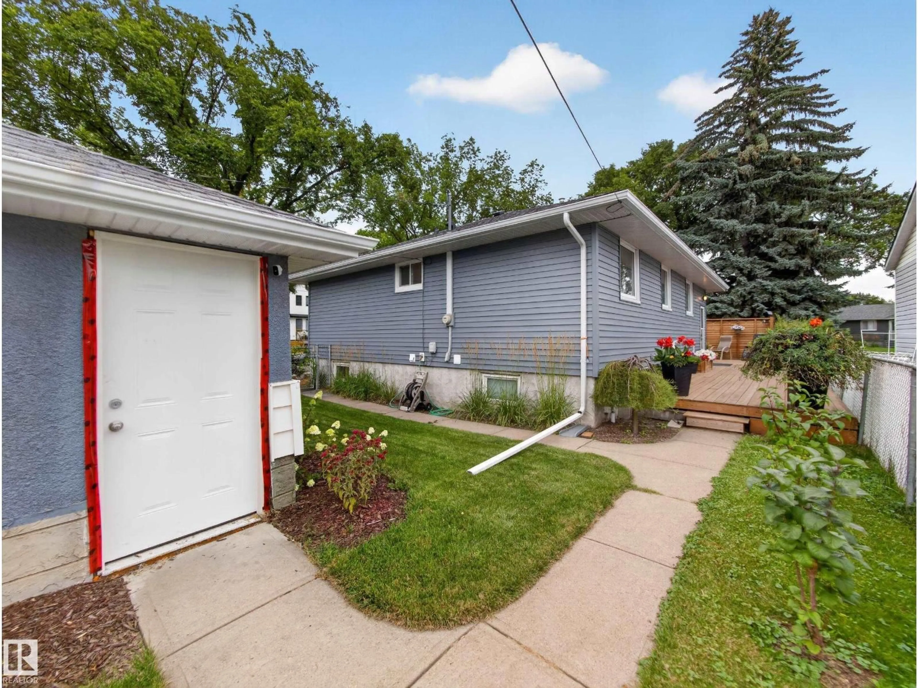 Home with vinyl exterior material, street for NW - 14003 123A AV, Edmonton Alberta T5L2Z3