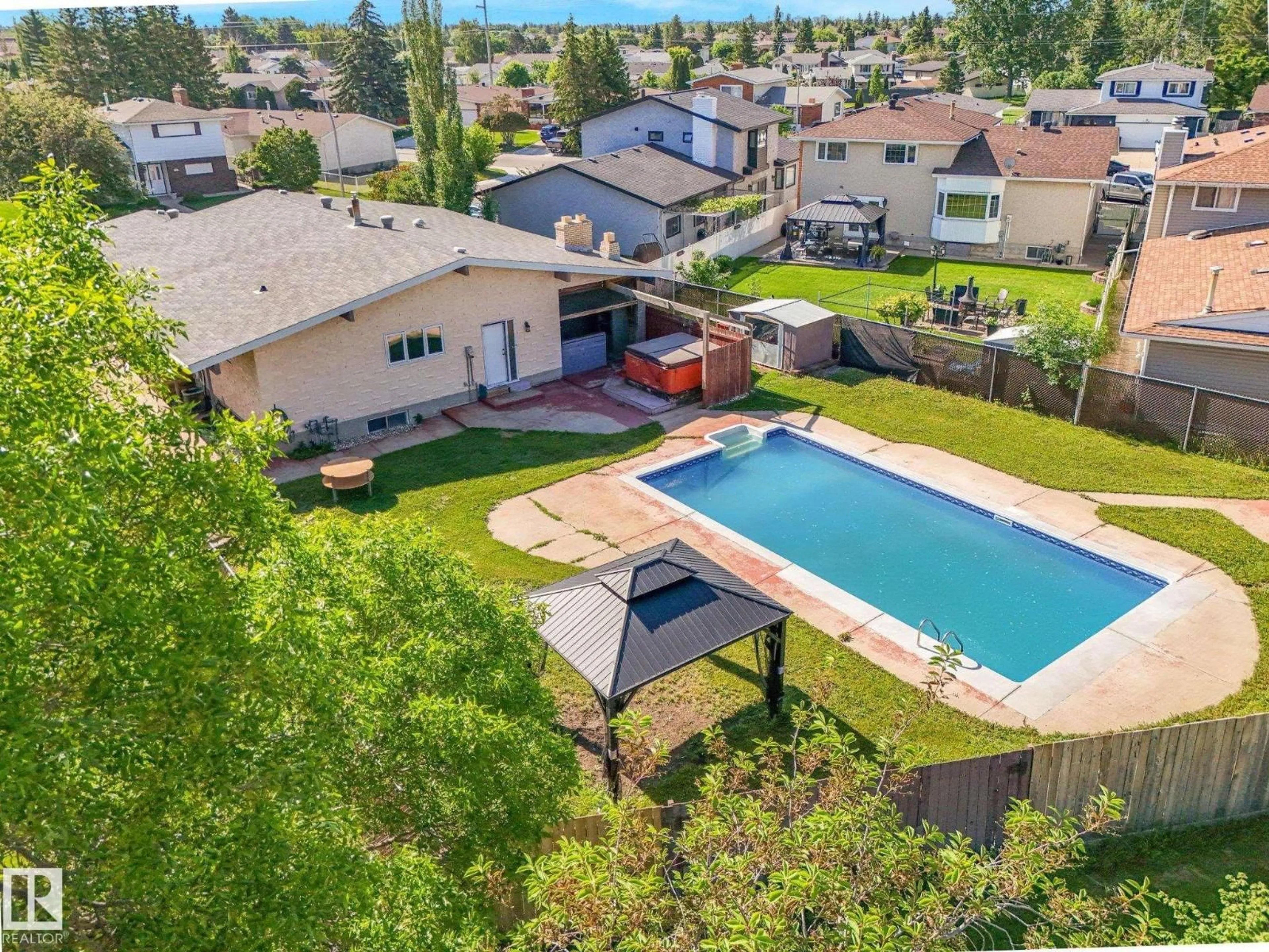 A pic from outside/outdoor area/front of a property/back of a property/a pic from drone, water/lake/river/ocean view for NW - 11056 166 AV, Edmonton Alberta T5X1Y3