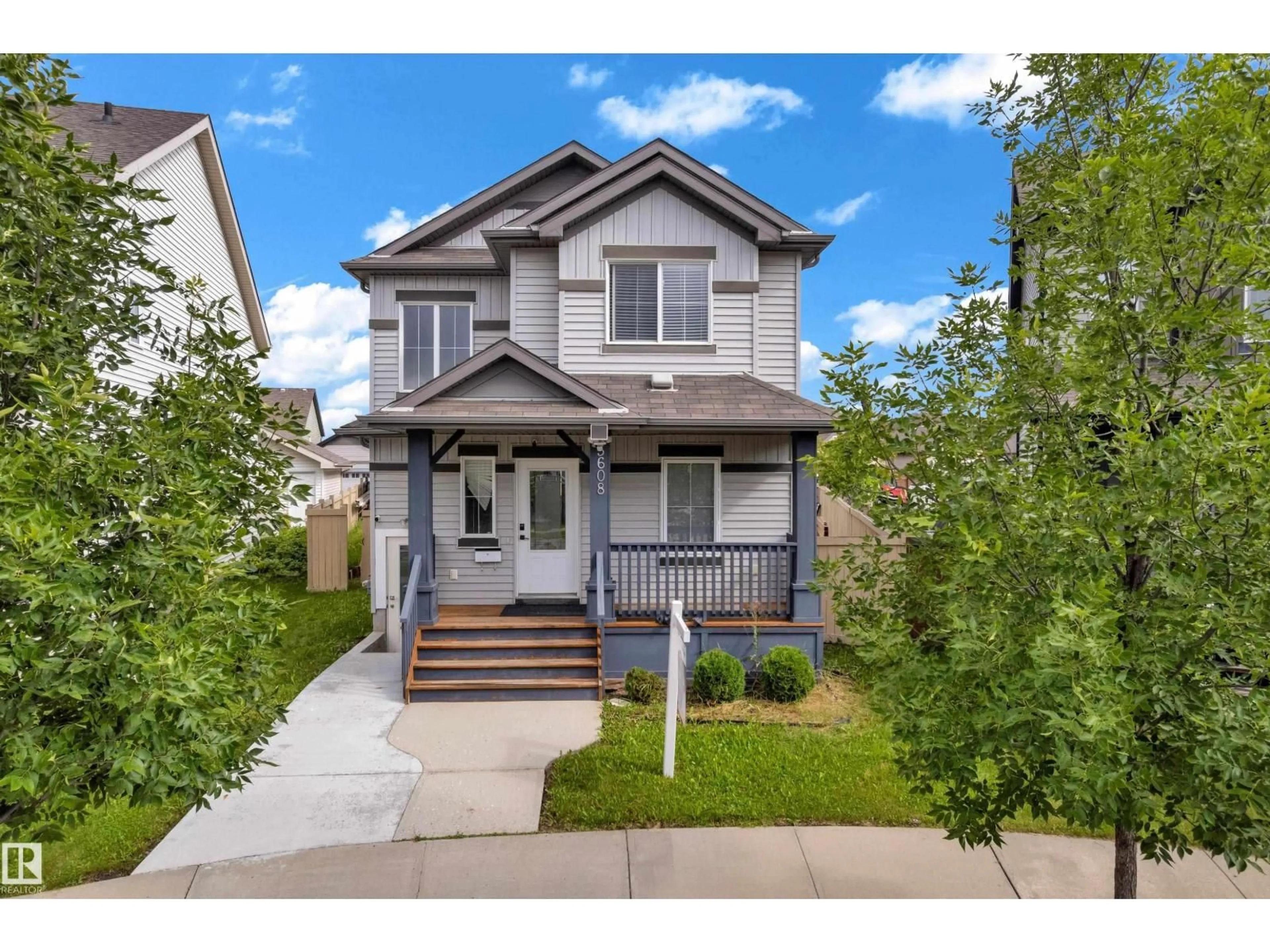 Home with vinyl exterior material, street for 5608 17 AV, Edmonton Alberta T6X1P8