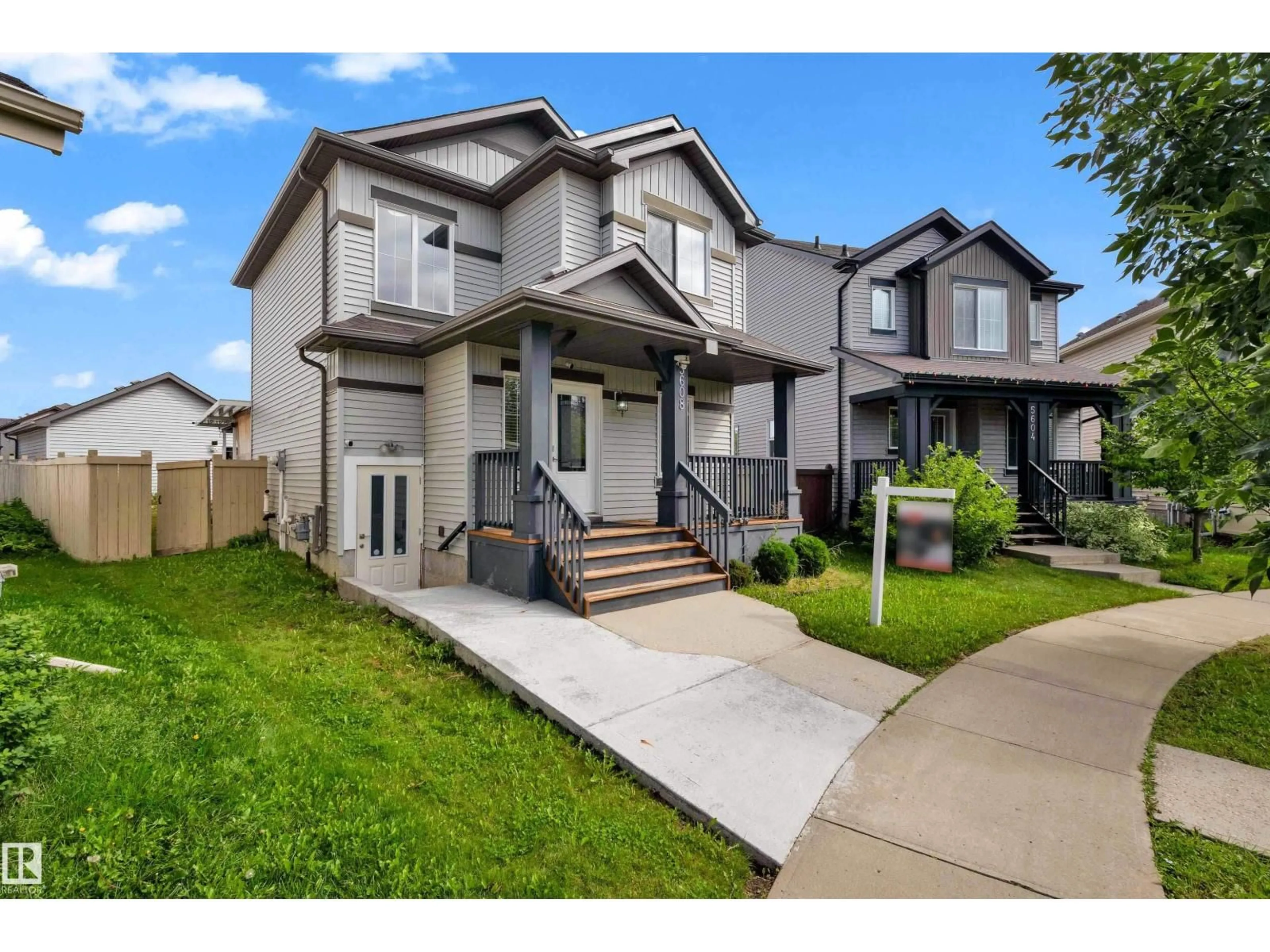 Home with vinyl exterior material, street for 5608 17 AV, Edmonton Alberta T6X1P8