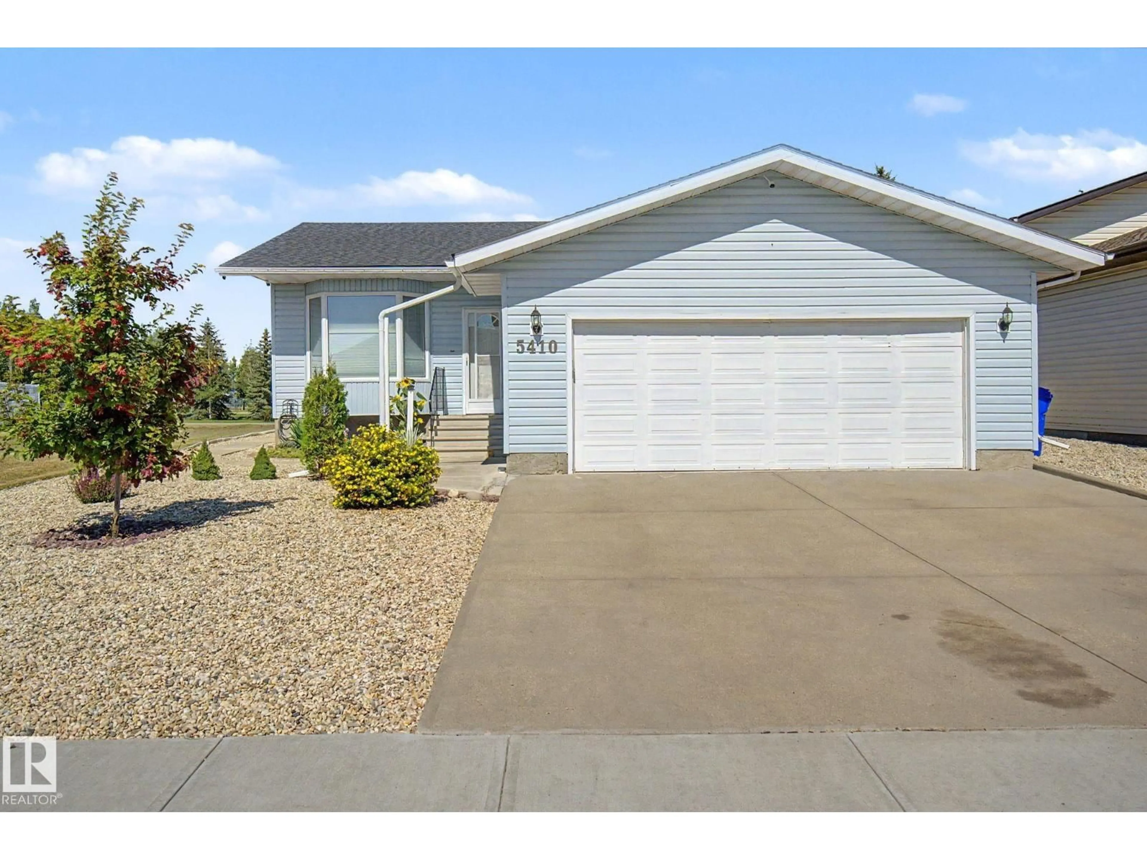 Home with vinyl exterior material, street for 5410 51 AV, Bruderheim Alberta T0B0S0