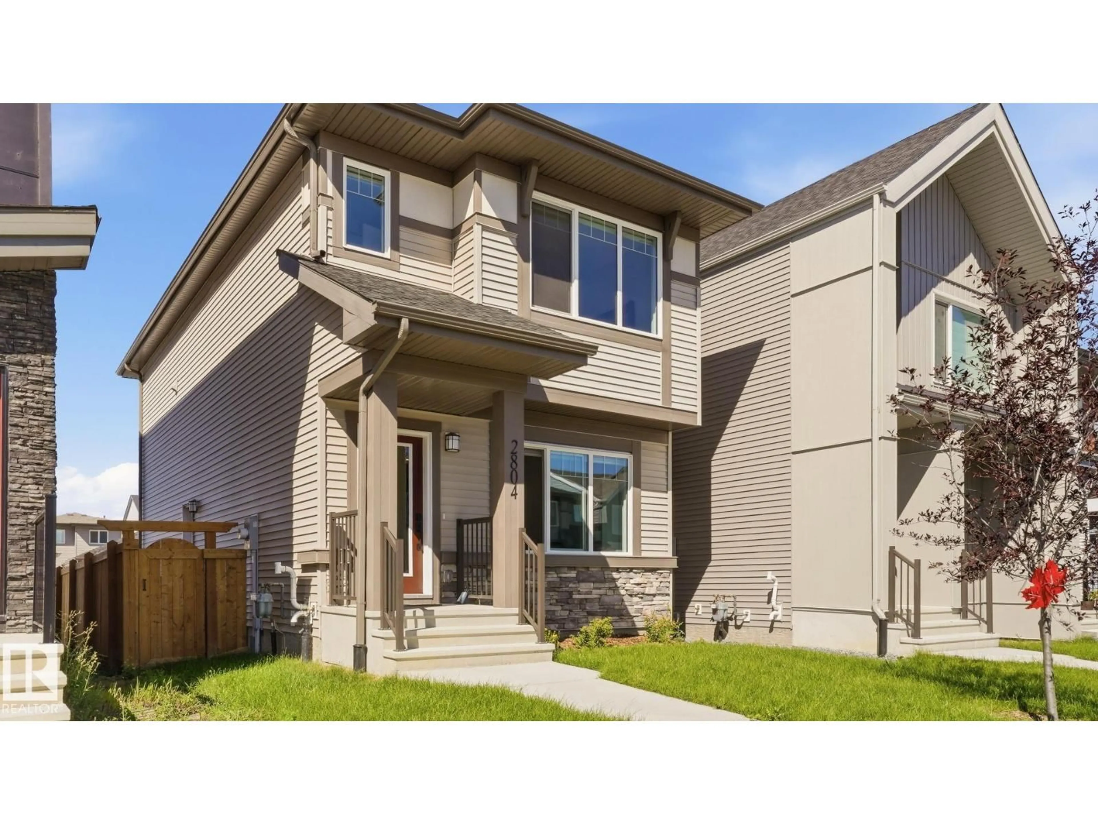Home with vinyl exterior material, street for NW - 2804 193 ST, Edmonton Alberta T6M3B2