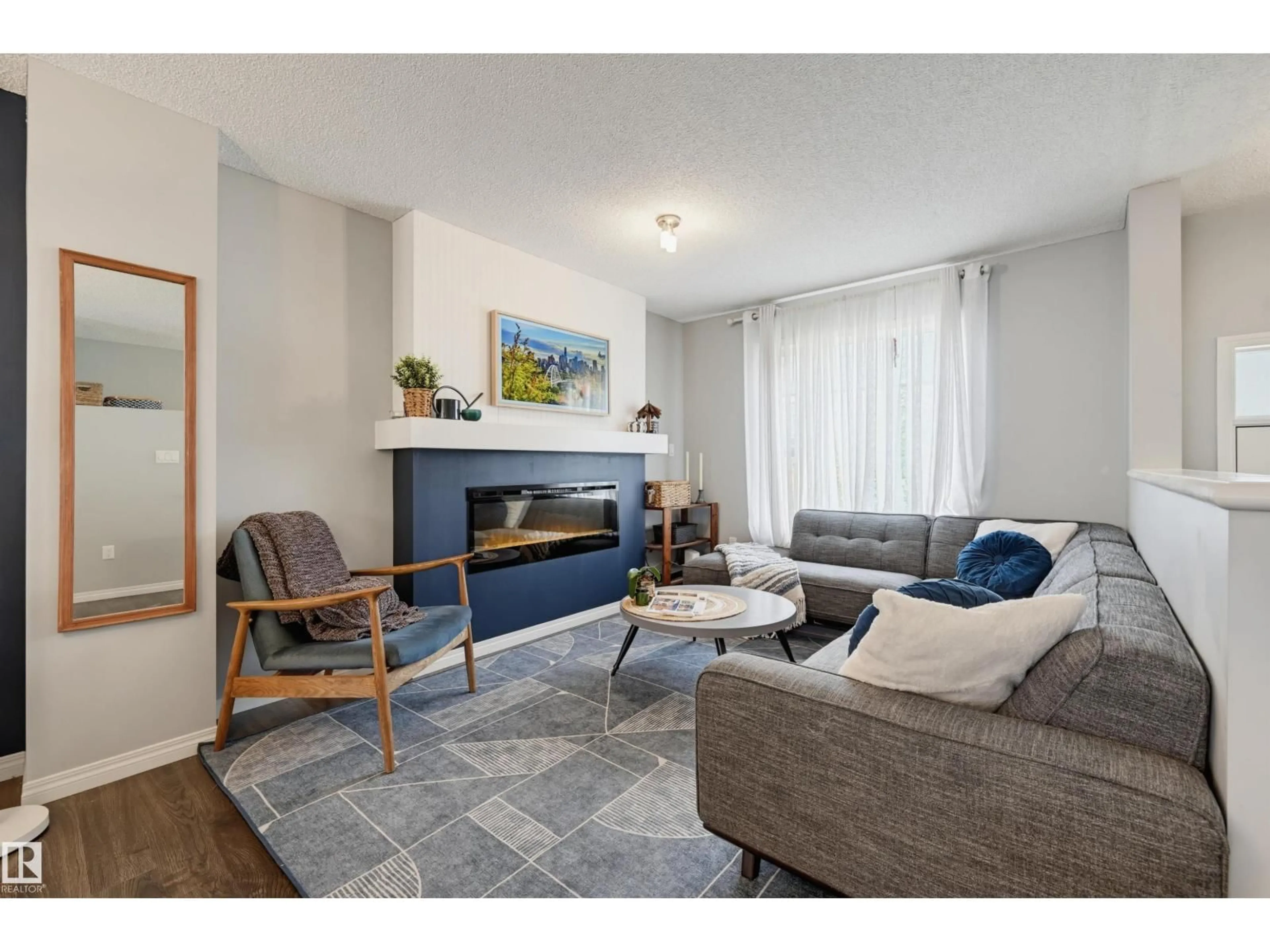 Living room with furniture, unknown for 126 2905 141 ST SW, Edmonton Alberta T6W3M4