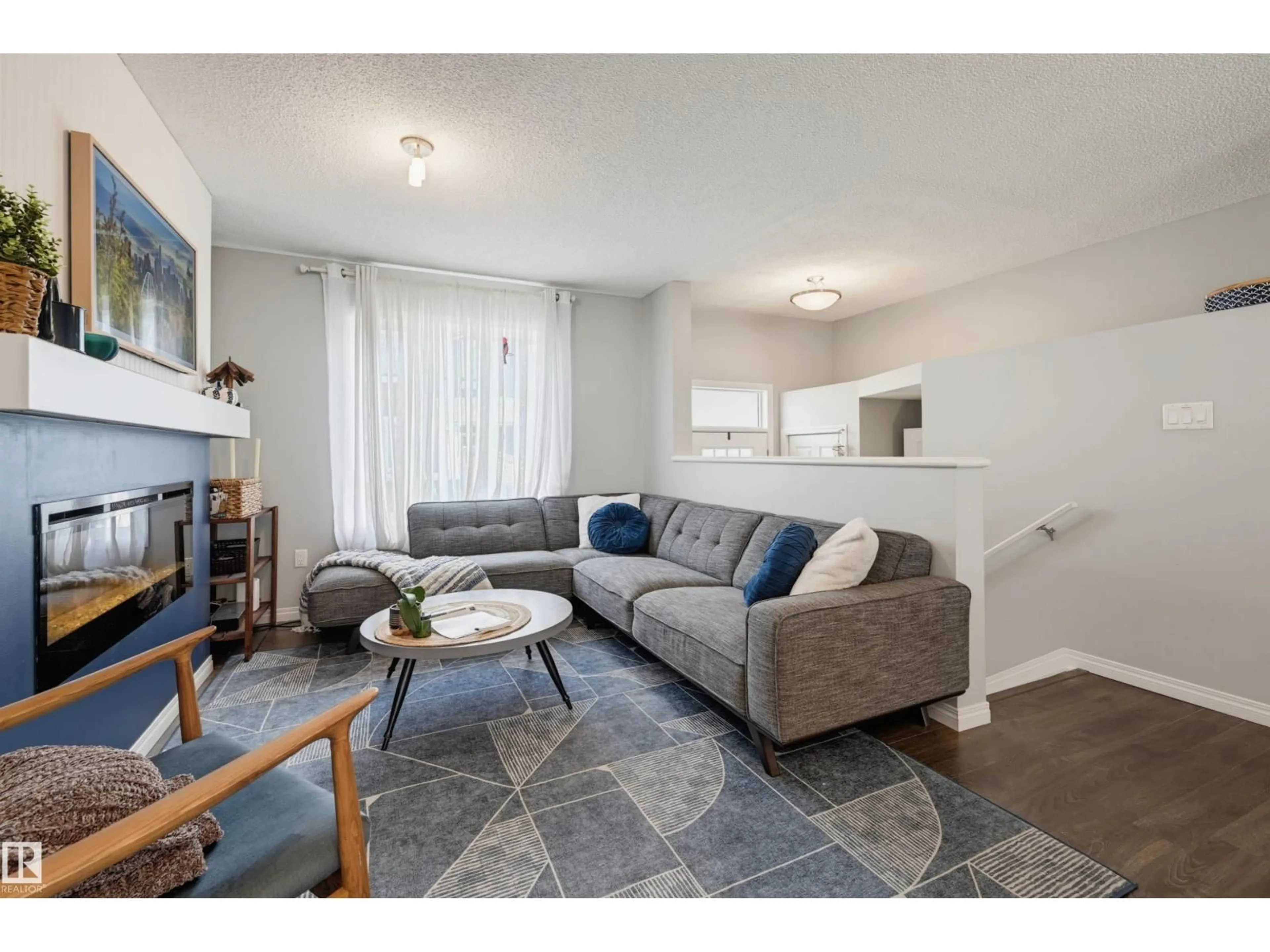 Living room with furniture, unknown for 126 2905 141 ST SW, Edmonton Alberta T6W3M4