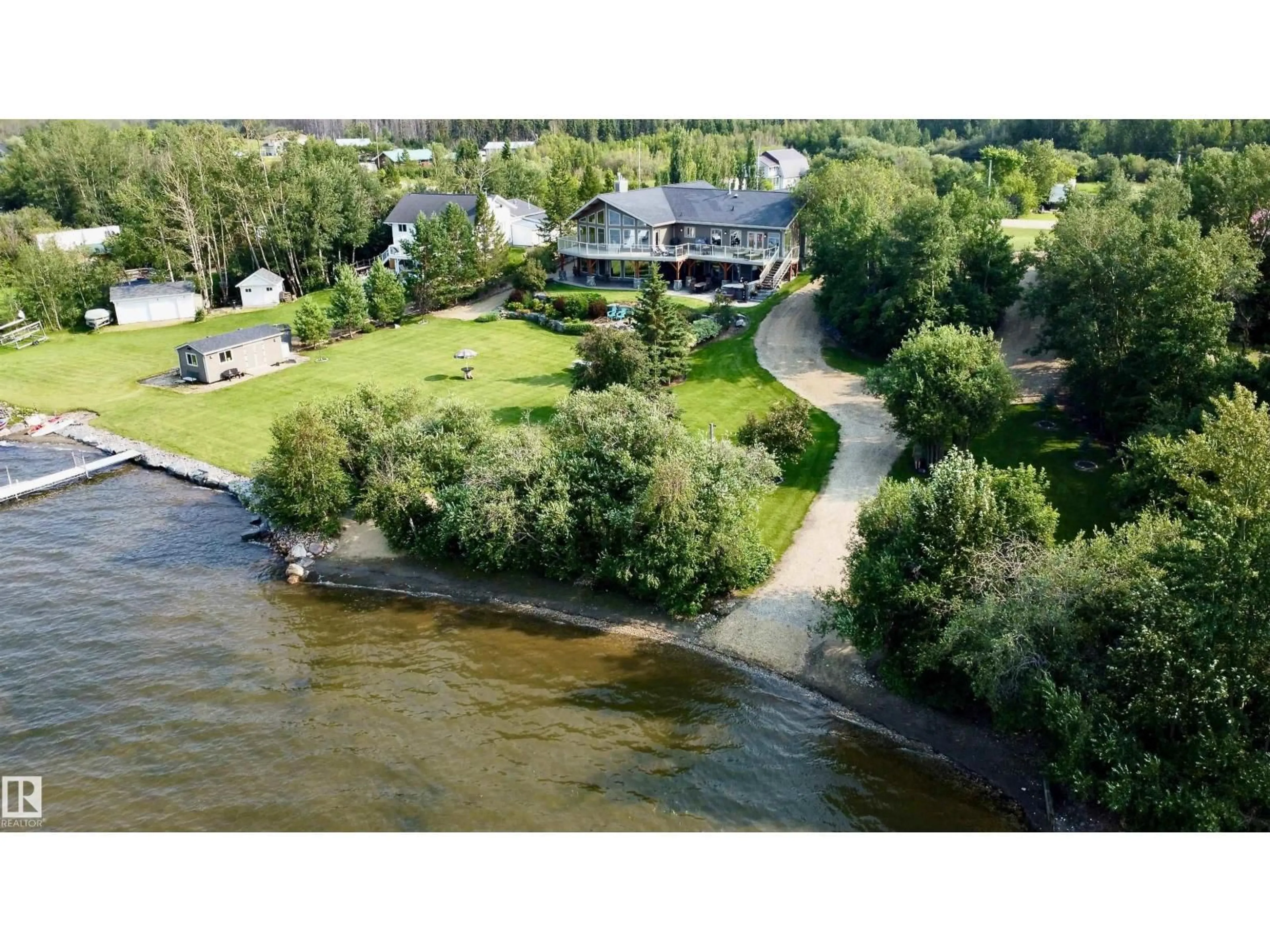 A pic from outside/outdoor area/front of a property/back of a property/a pic from drone, water/lake/river/ocean view for #8 & 9 - 52506 RGE ROAD 50, Rural Parkland County Alberta T0E2B0