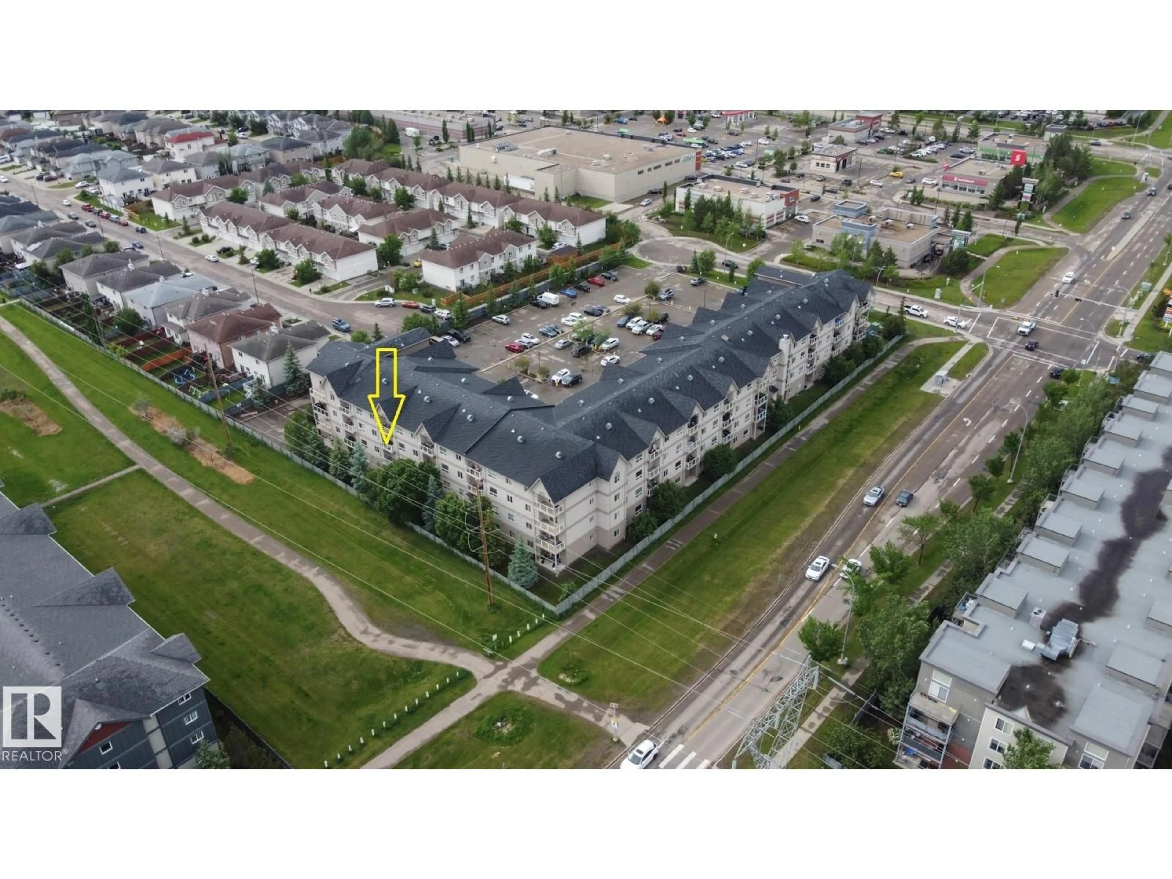A pic from outside/outdoor area/front of a property/back of a property/a pic from drone, unknown for 316 - 5005 165 AV, Edmonton Alberta T5Y0L8