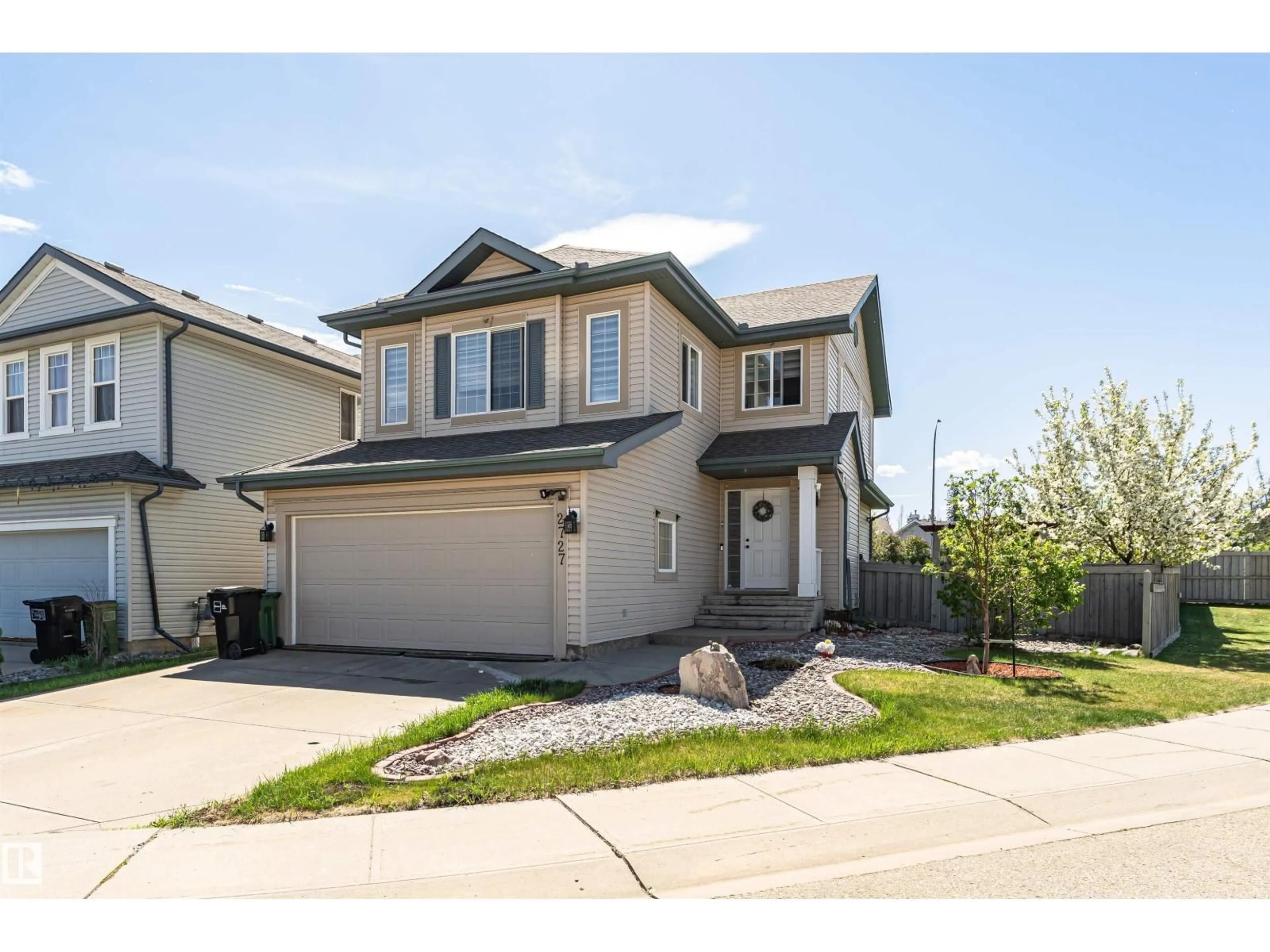Home with vinyl exterior material, street for 2727 MILES PL, Edmonton Alberta T6W0B3