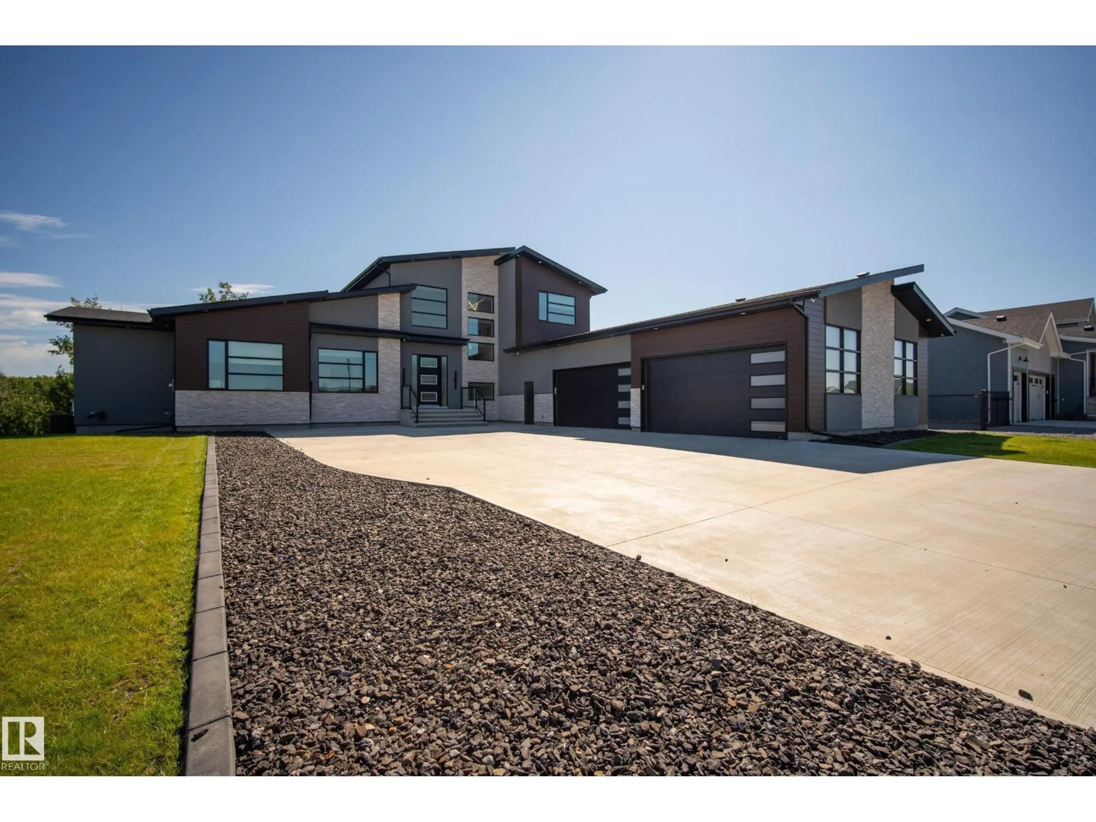 Home with brick exterior material, street for 52 HARVEST CR, Ardrossan Alberta T8E0A3