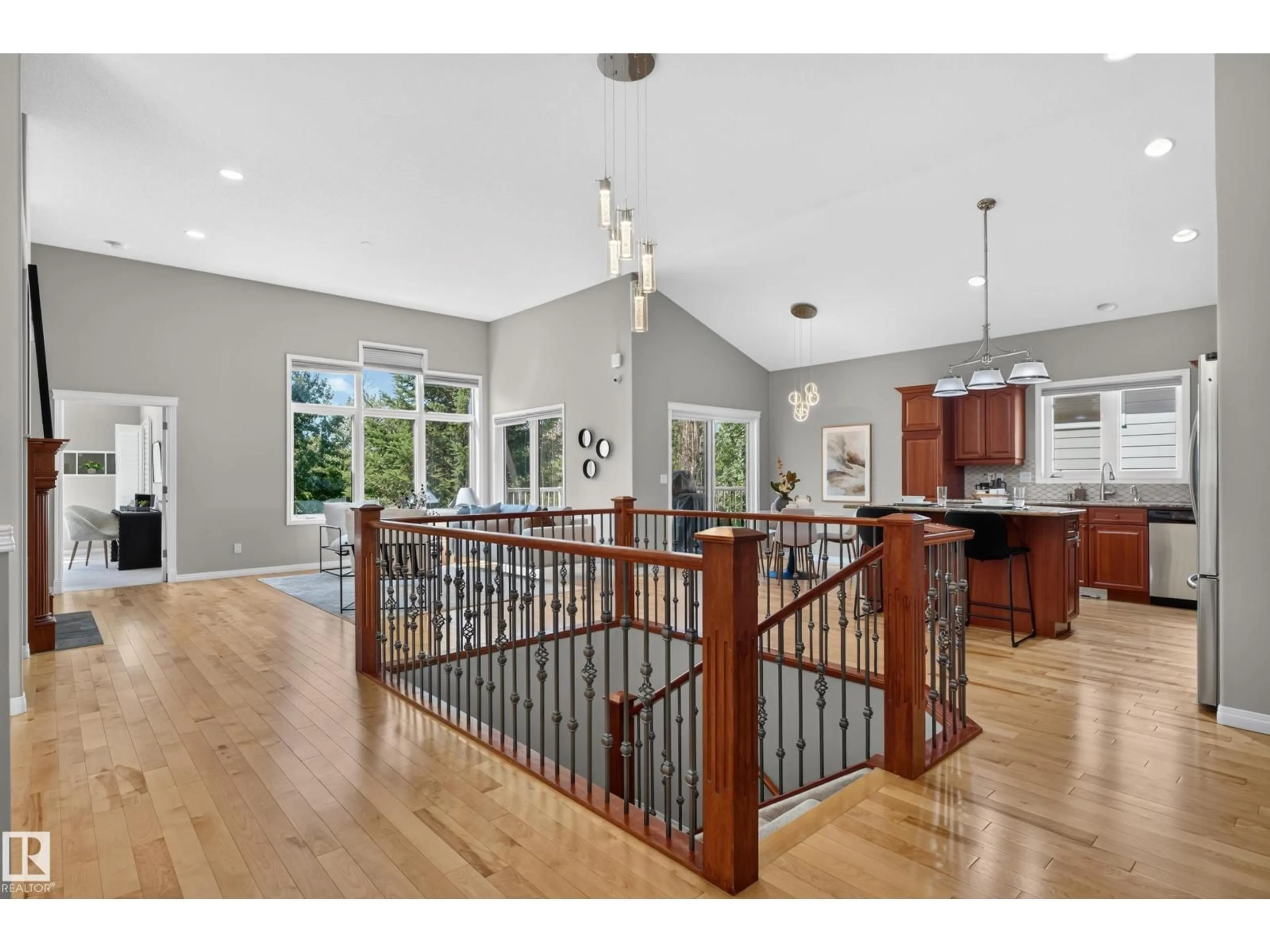 Open concept kitchen, wood/laminate floor for 18343 - 20 LESSARD RD, Edmonton Alberta T6M2Y5