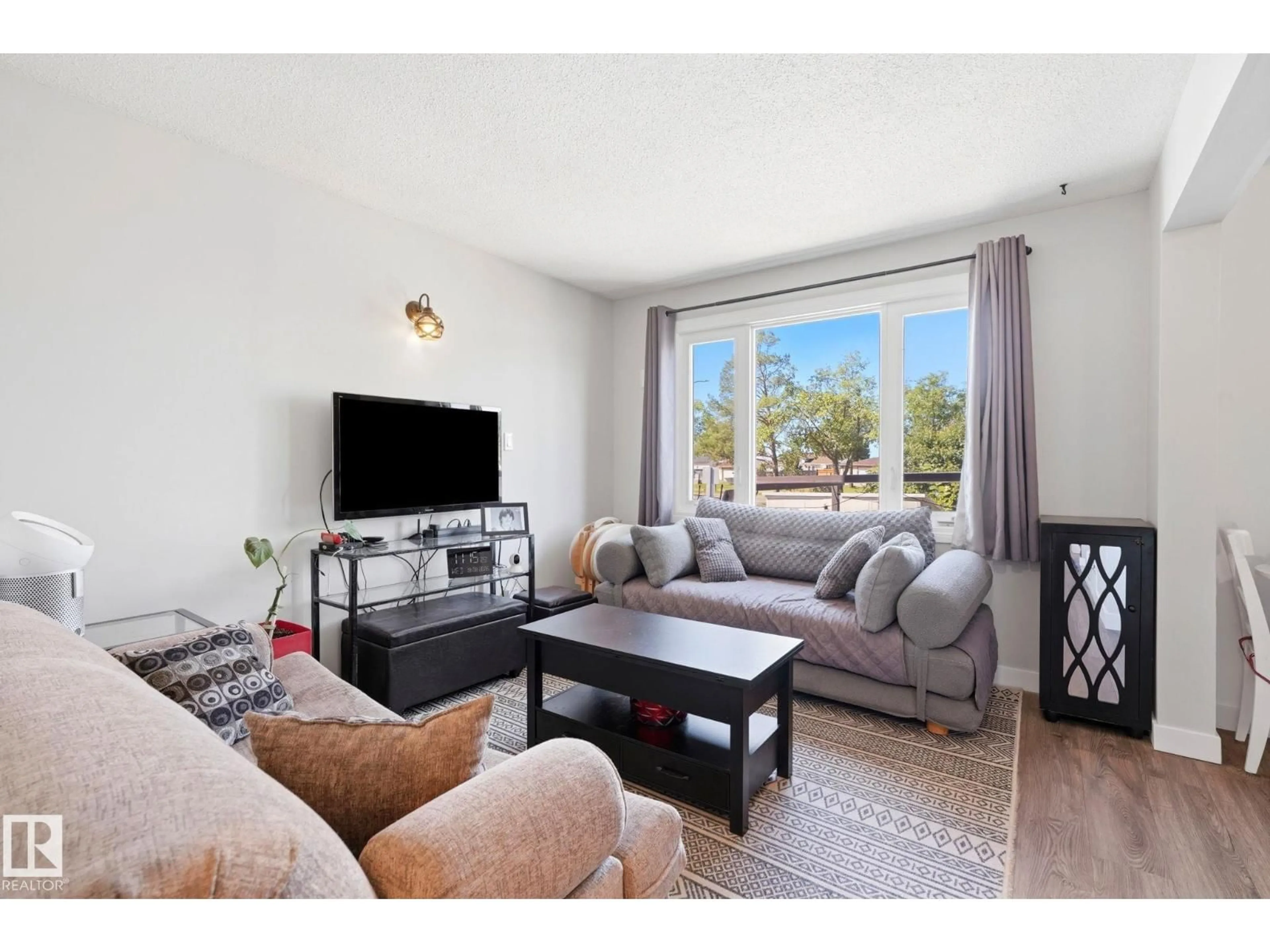 Living room with furniture, unknown for 14235 82 ST, Edmonton Alberta T5E2V7