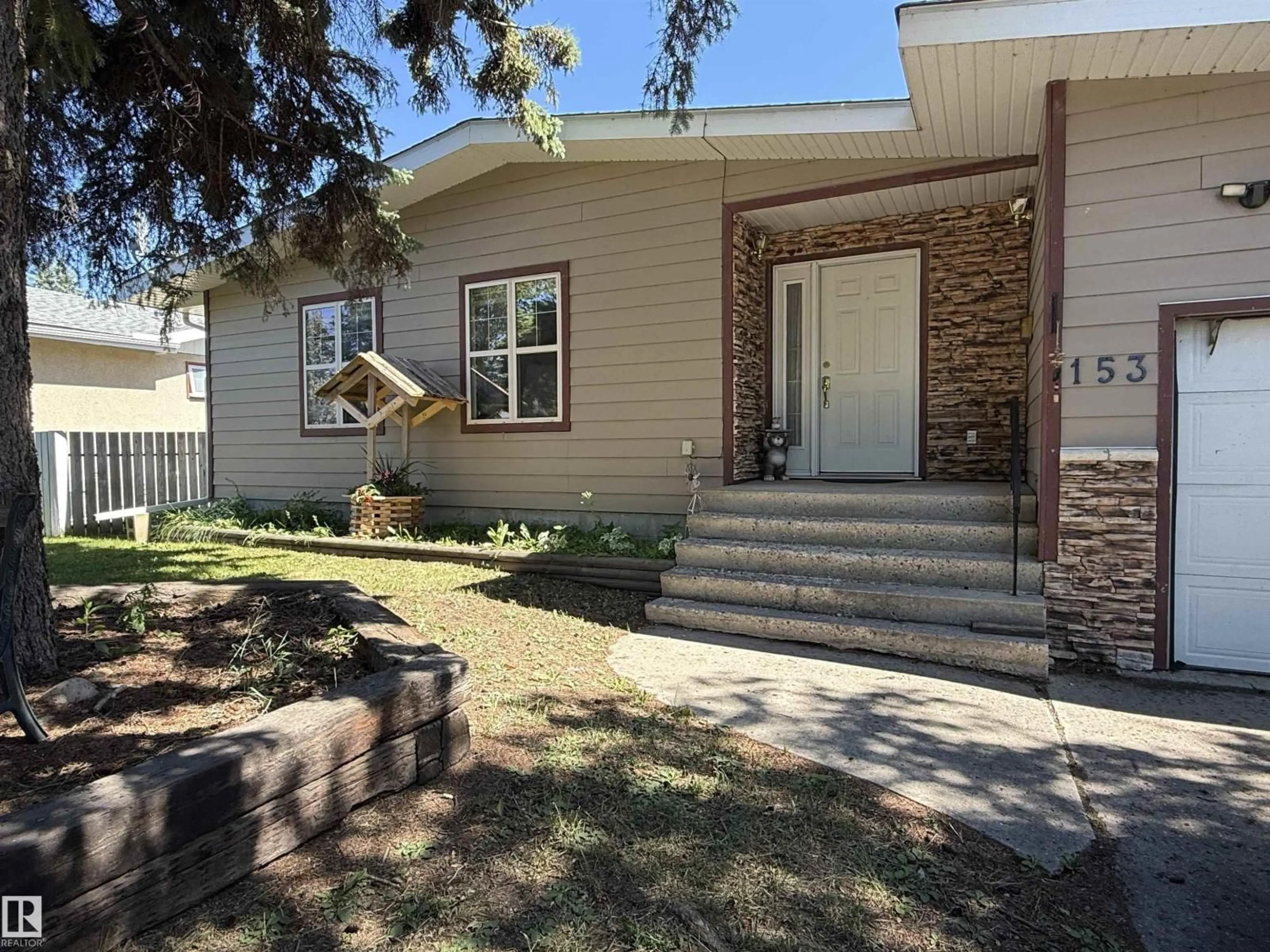 Home with brick exterior material, street for 153 MAPLE CR, Wetaskiwin Alberta T9A2E3