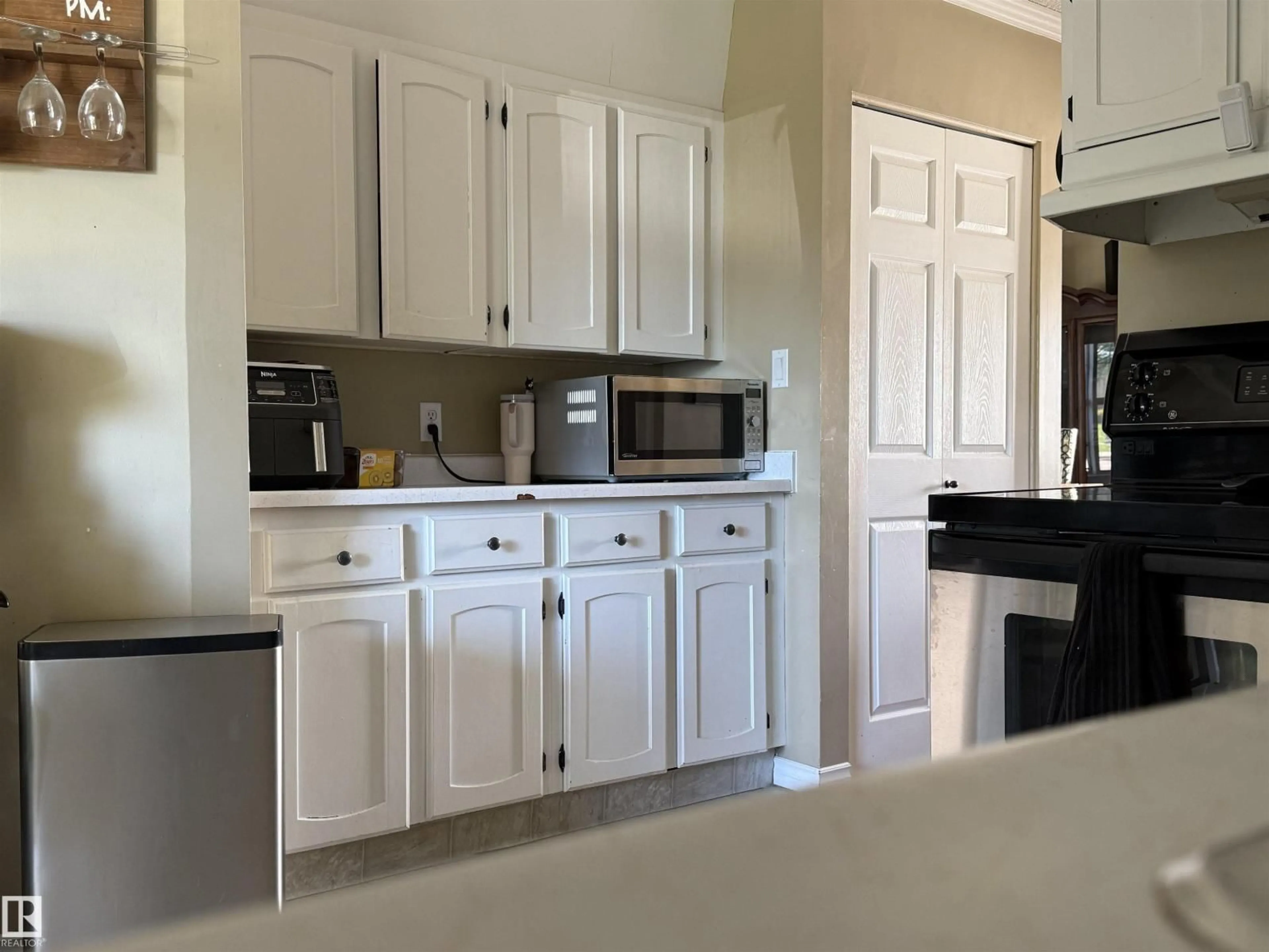 Open concept kitchen, ceramic/tile floor for 153 MAPLE CR, Wetaskiwin Alberta T9A2E3