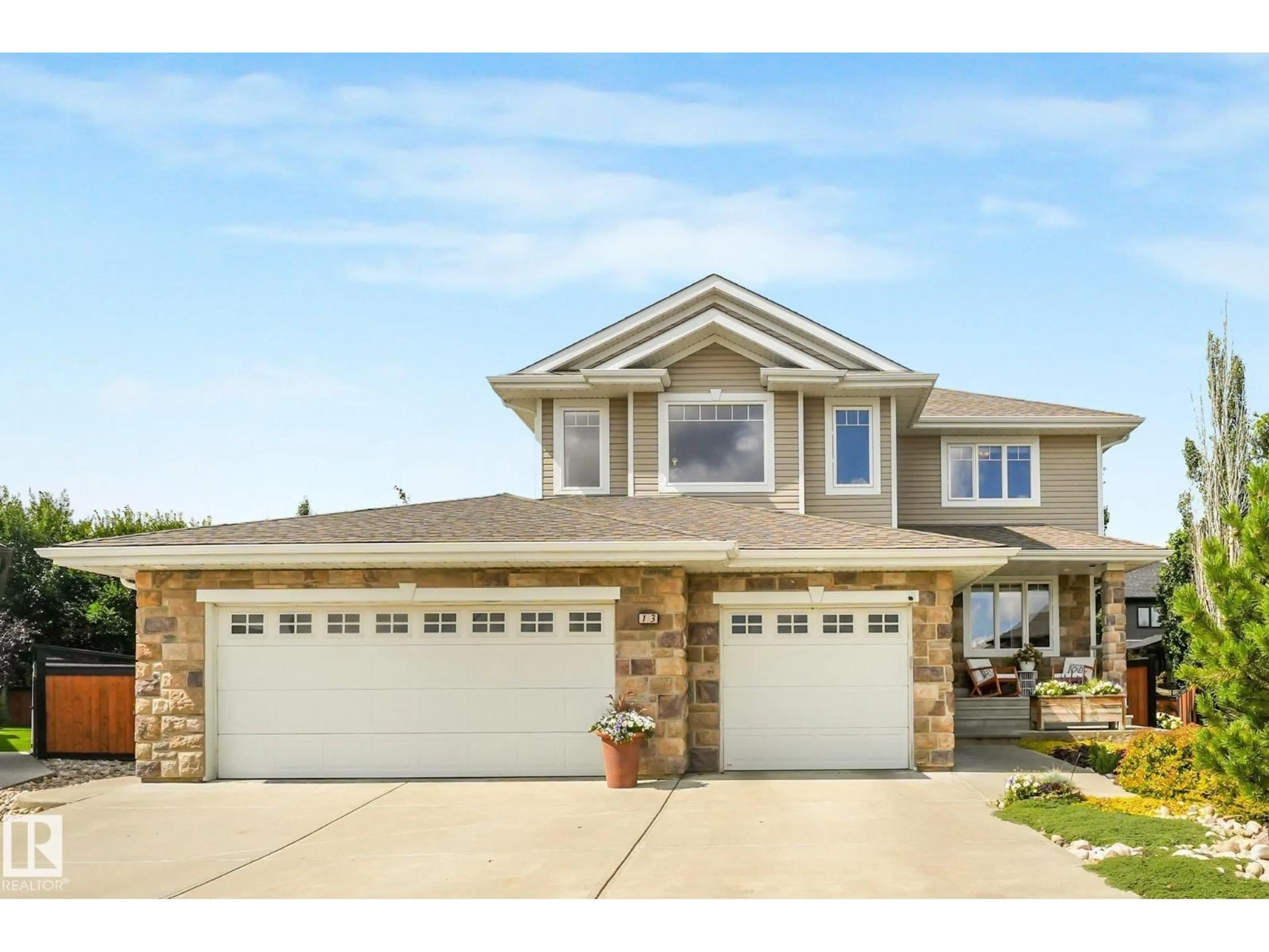 Home with vinyl exterior material, street for 13 DILLON BA, Spruce Grove Alberta T7X0E5